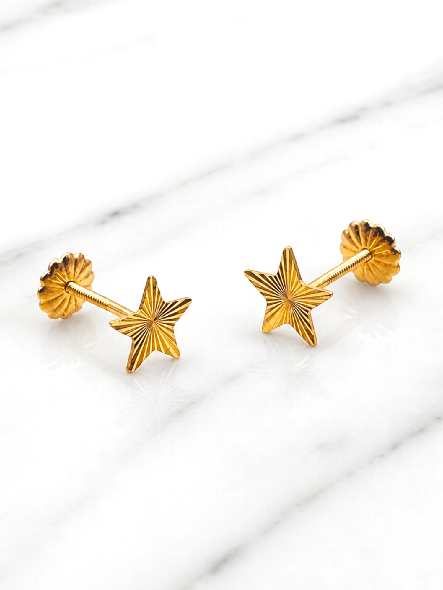 Aros estrellas talladas Oro 18k 3