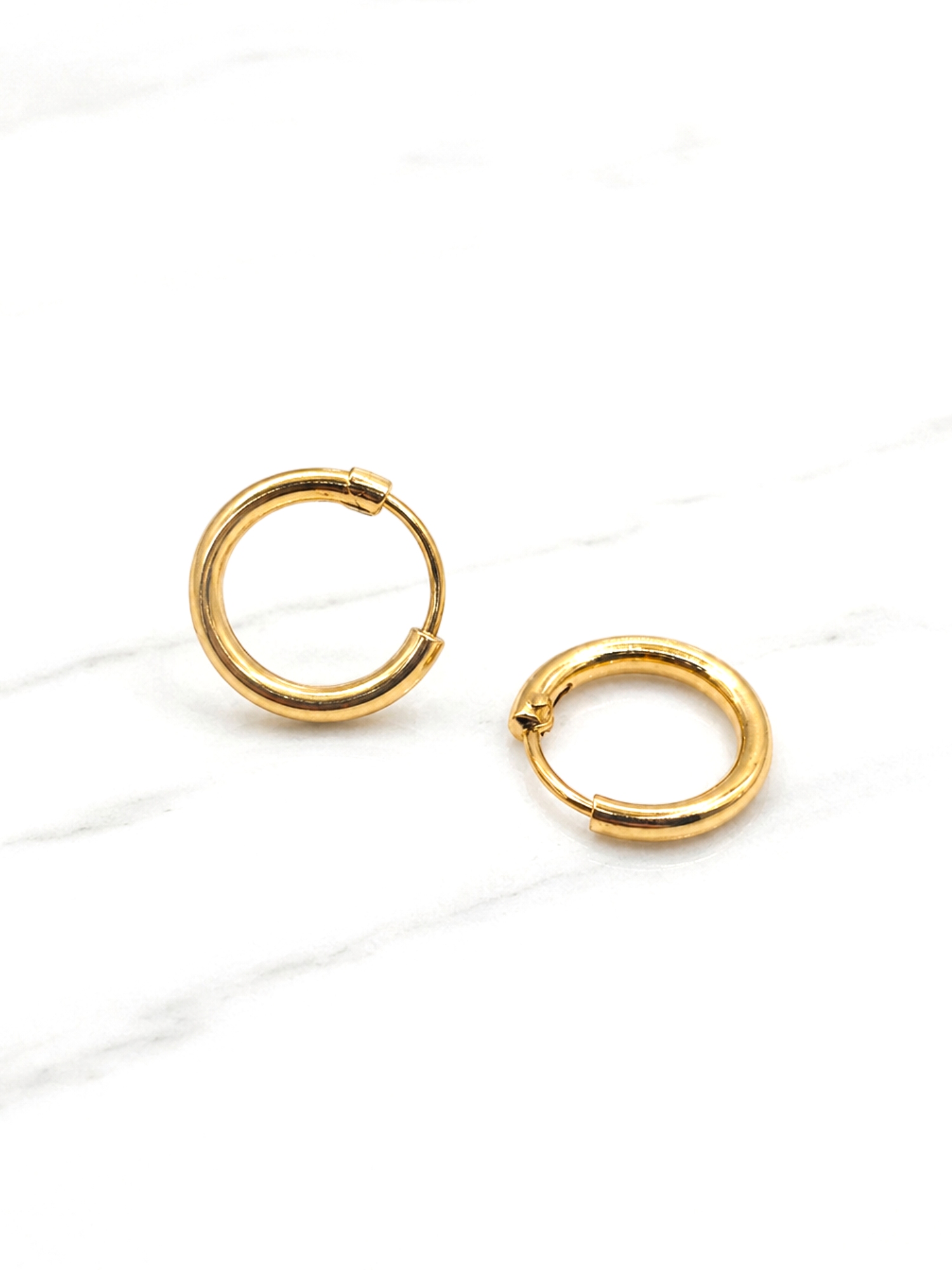 Aros argolla tubo número 1 Oro 18k 2