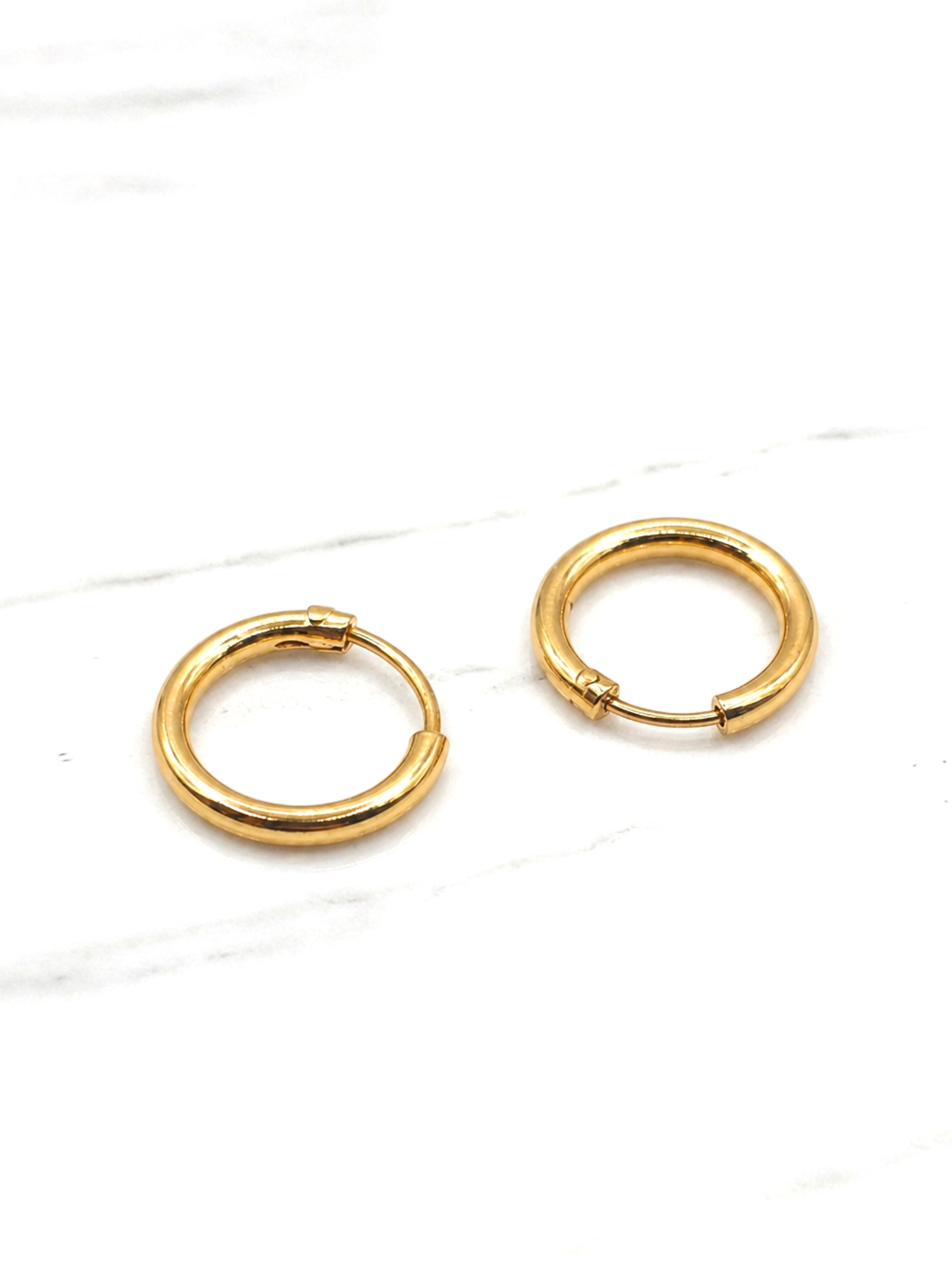 Aros argolla tubo número 1 Oro 18k 3