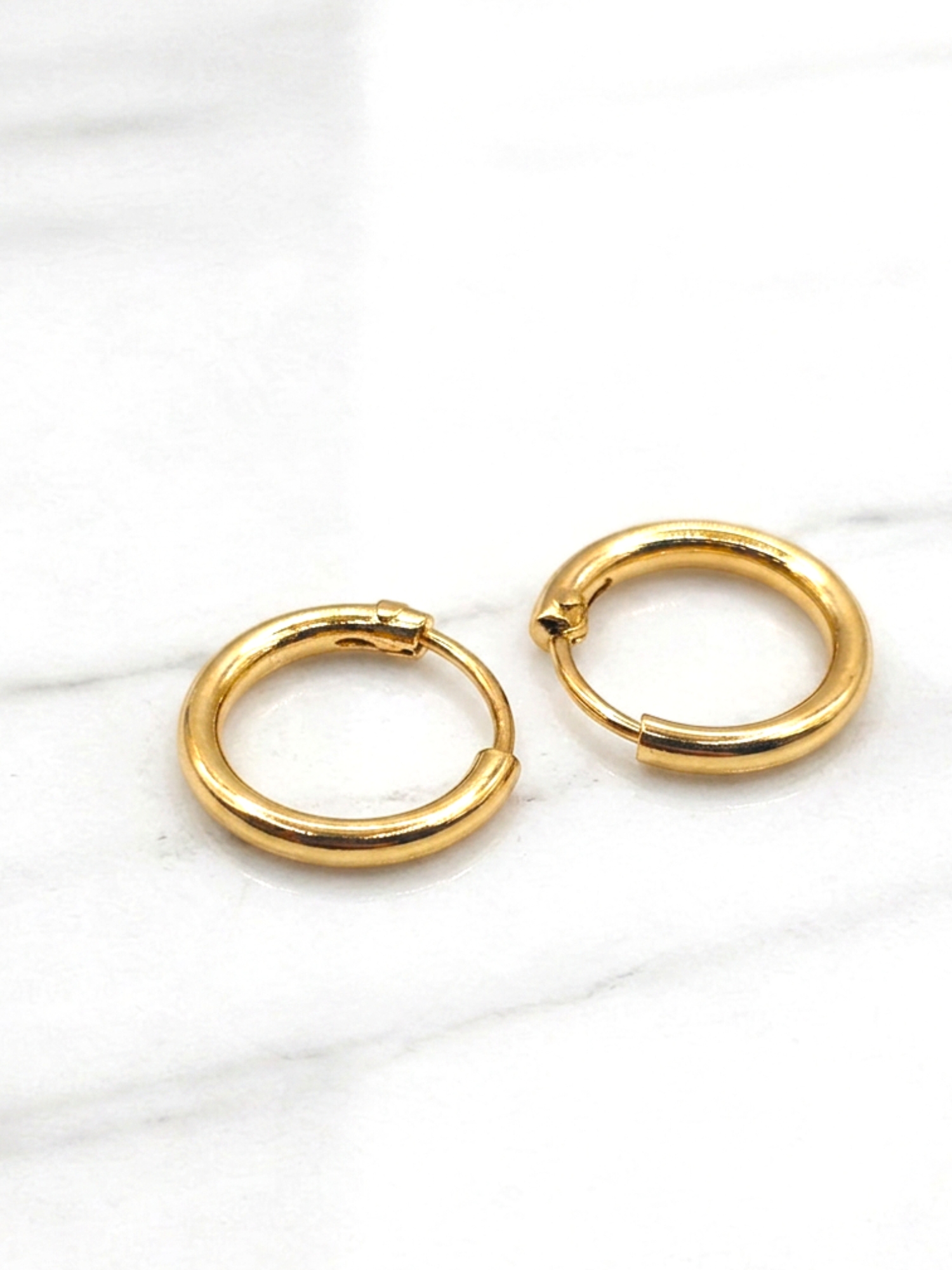 Aros argolla tubo número 1 Oro 18k 4