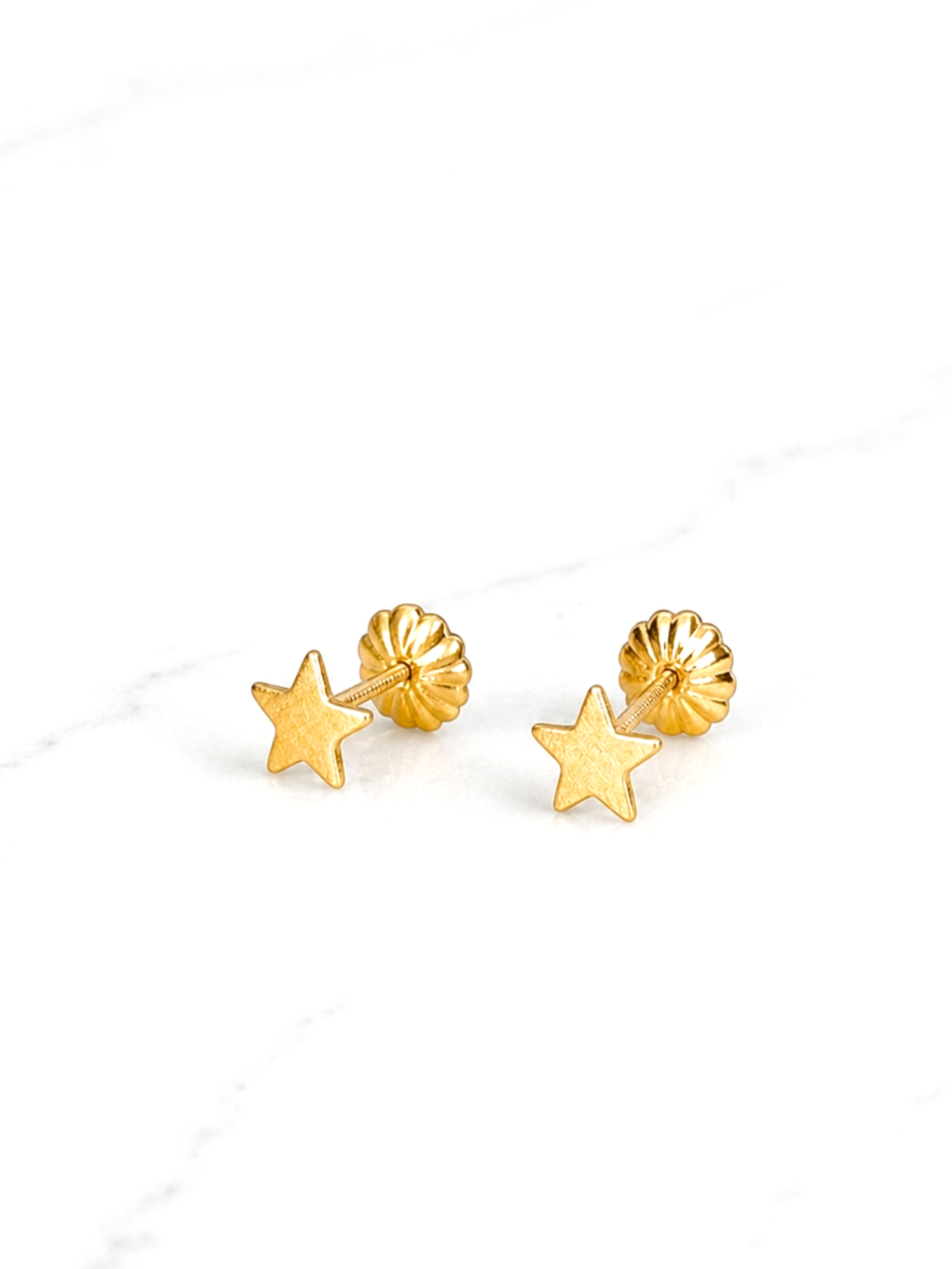 Aros estrellas chicos Oro 18k 3