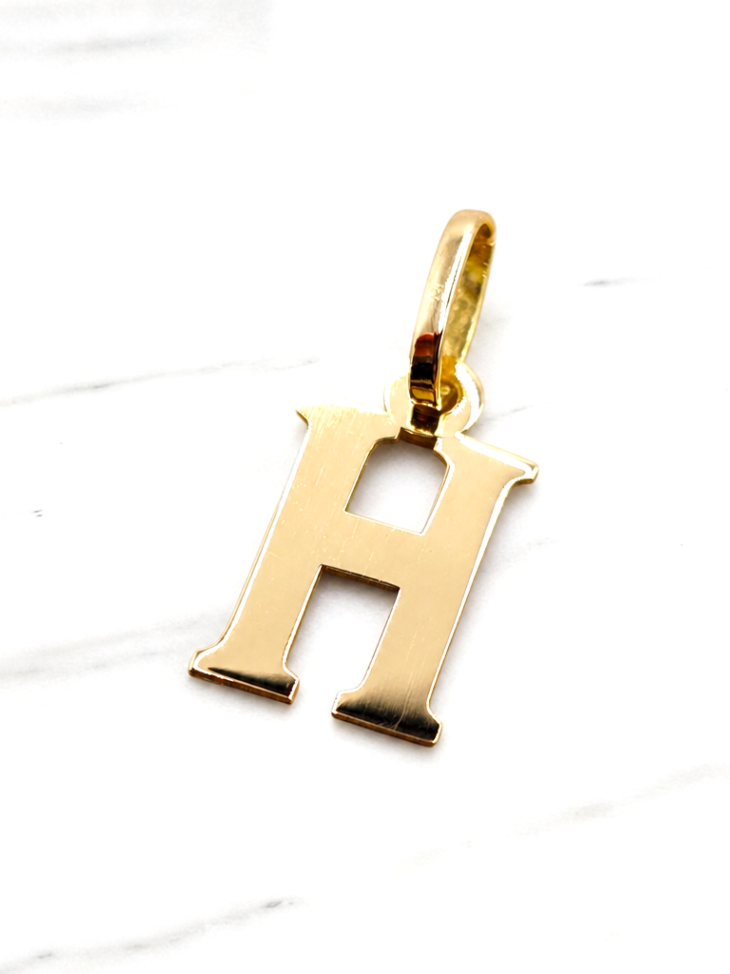 Colgante inicial 2 cm Oro 18k 10