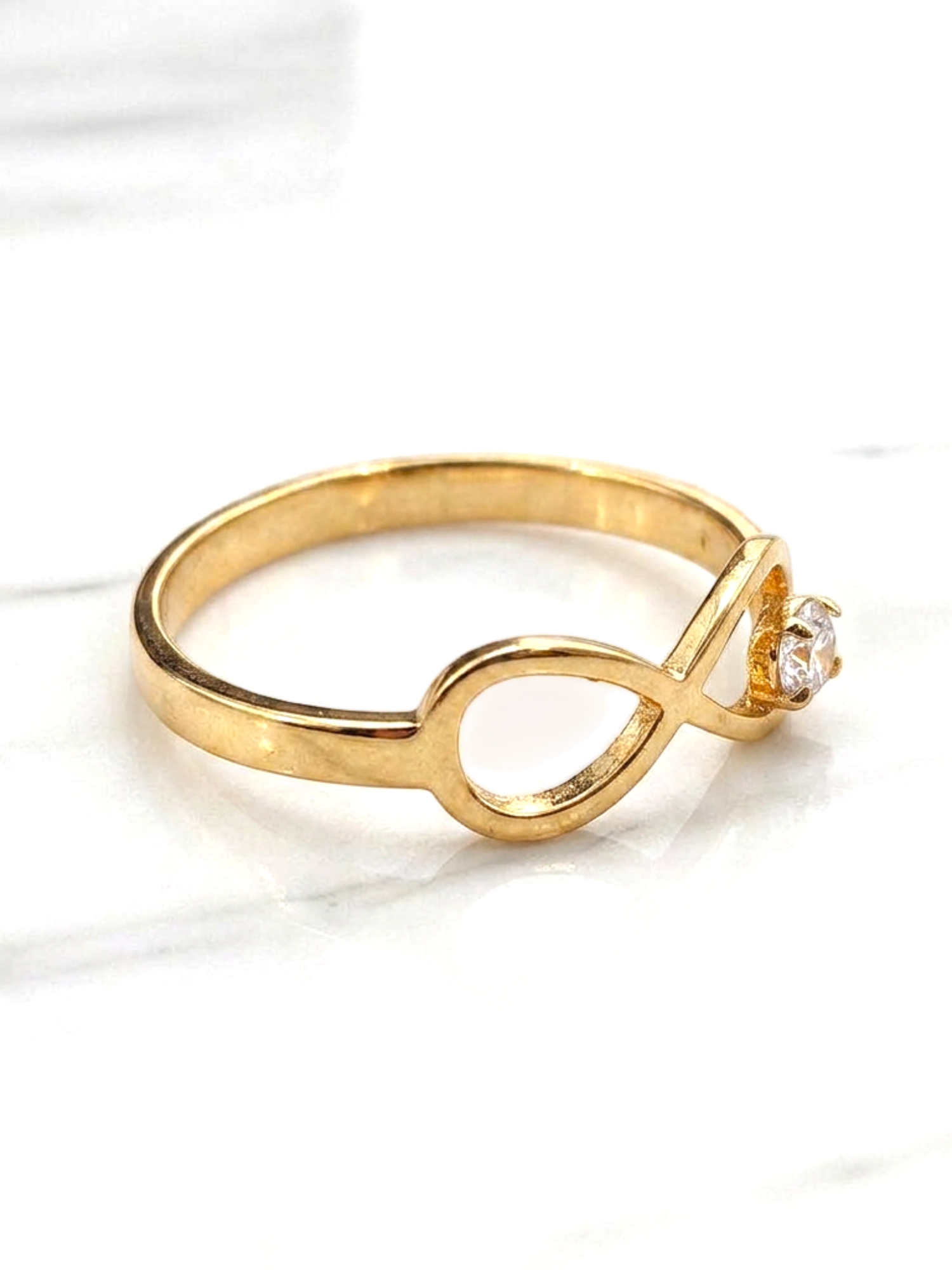 Anillo silueta infinito circón Oro 18k 2