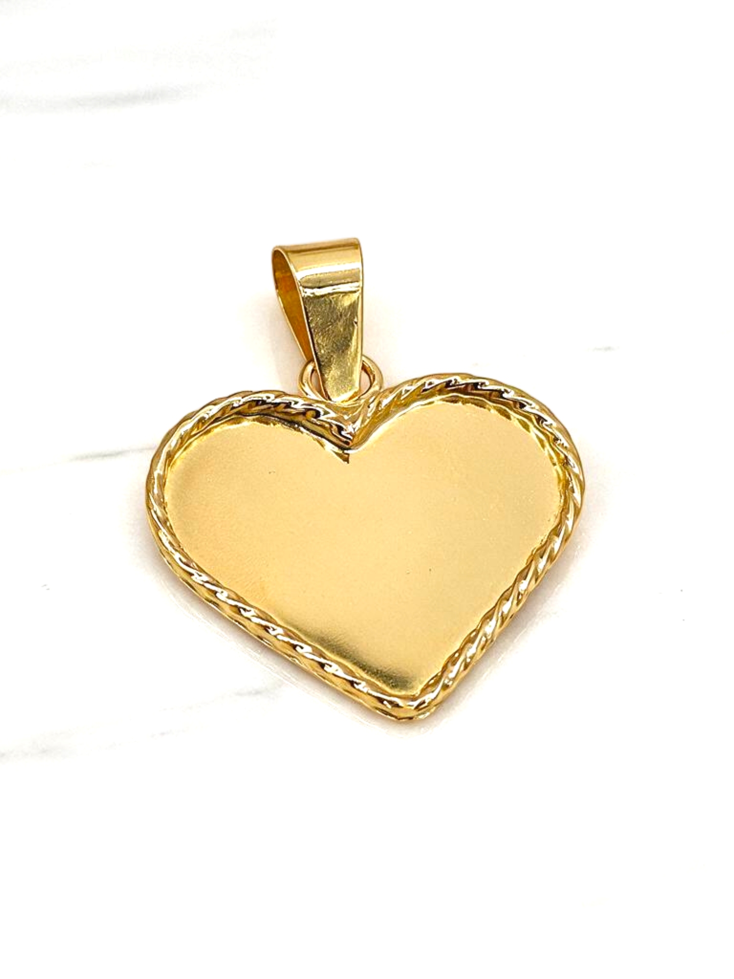 Colgante corazón nudo mediano Oro 18k 1