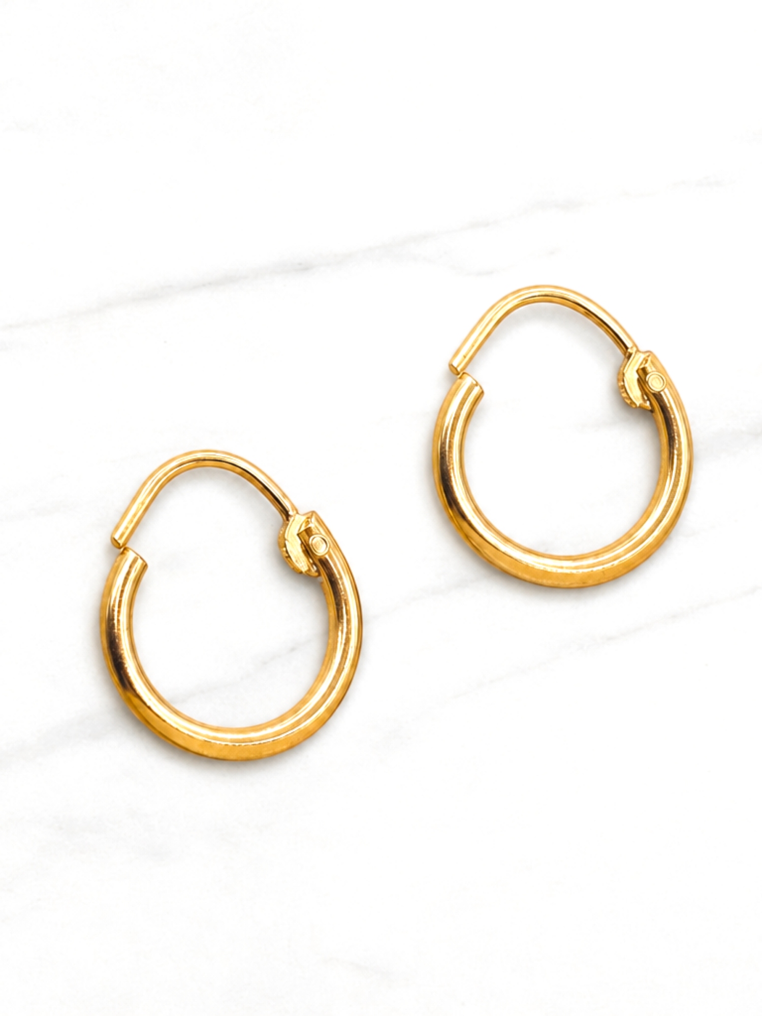 Aros argolla tubo número 2 Oro 18k 2