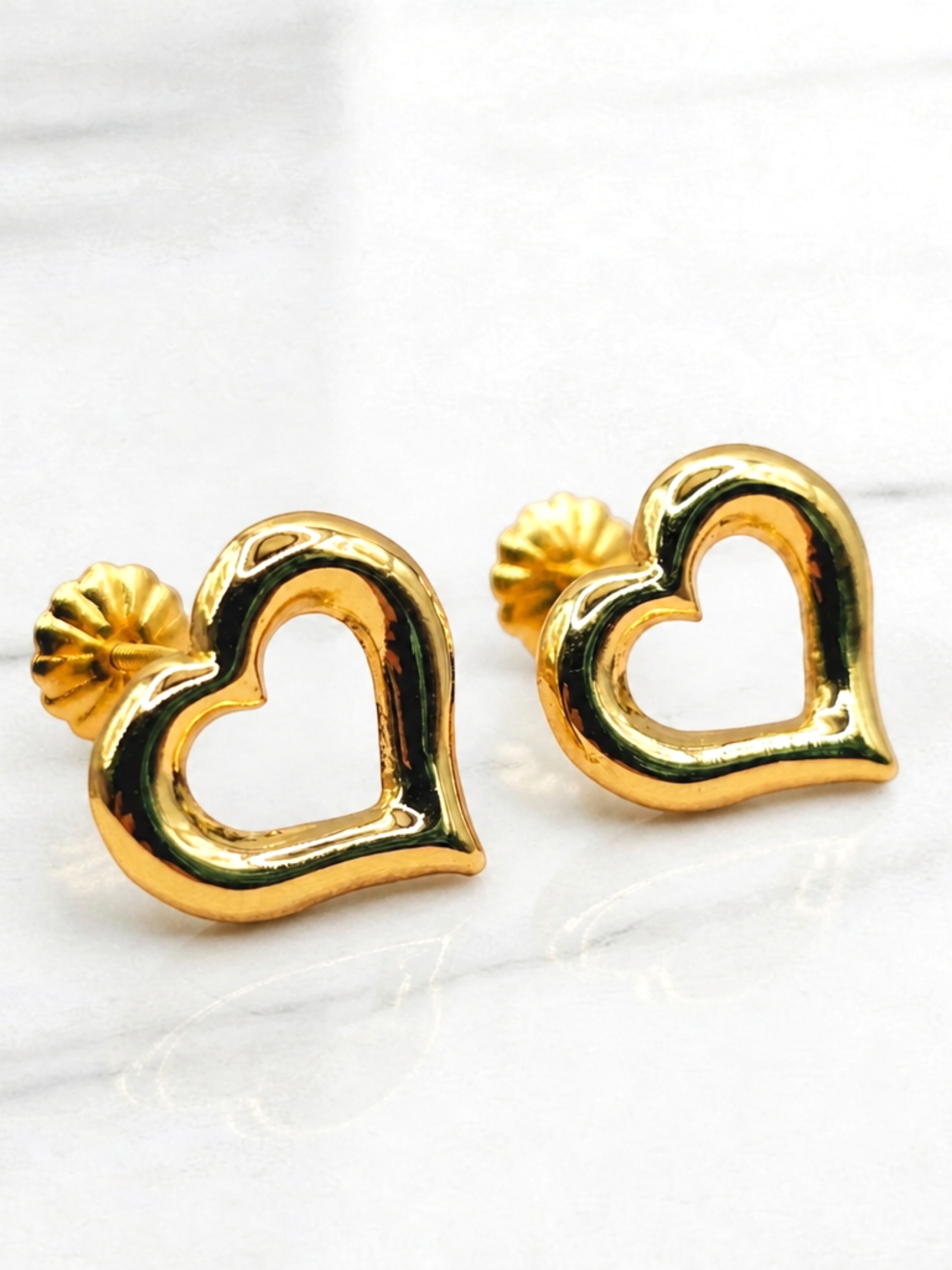Aros silueta corazón 1.2 cm Oro 18k  1