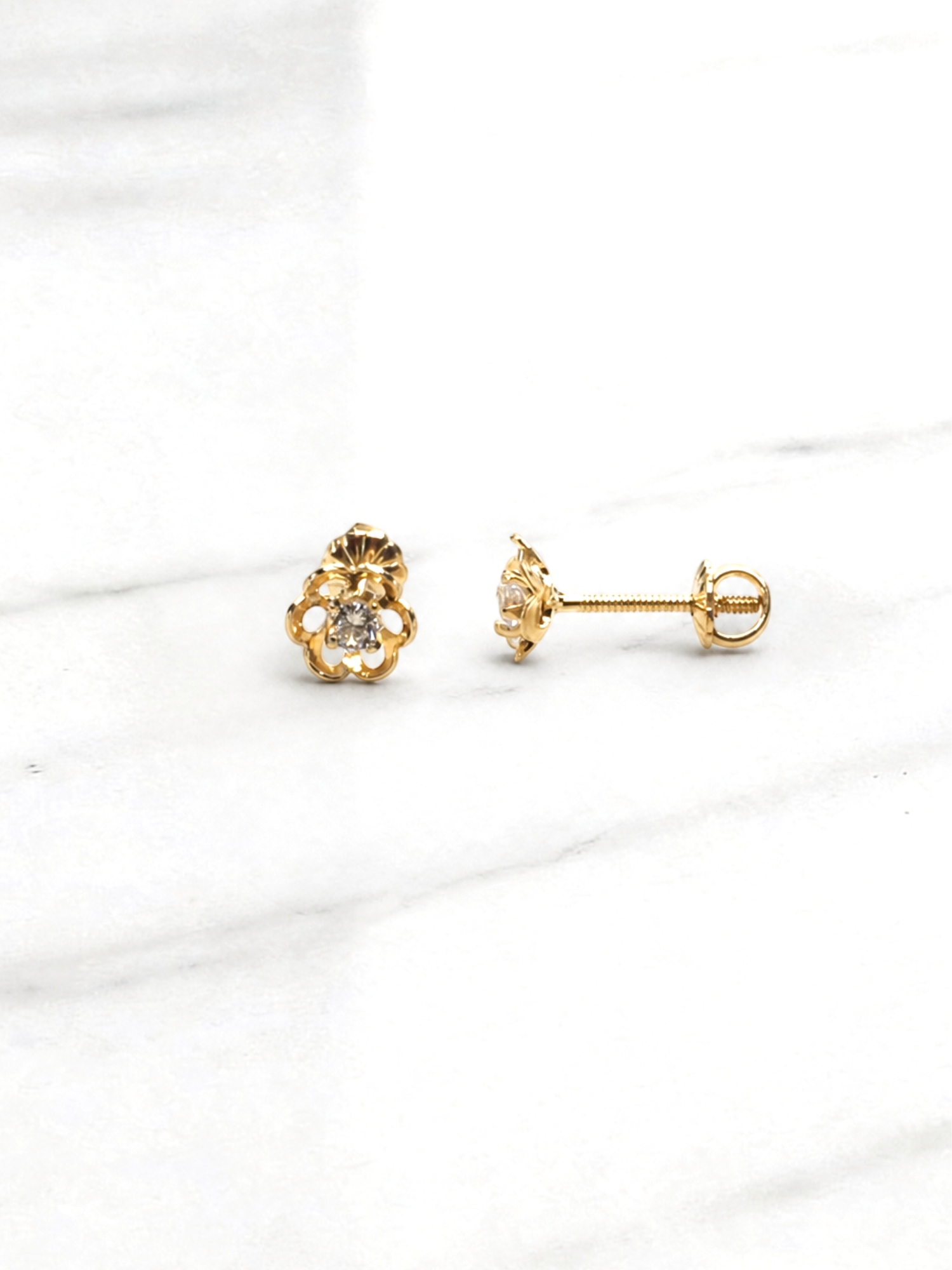 Aros flores circón Oro 18k 2