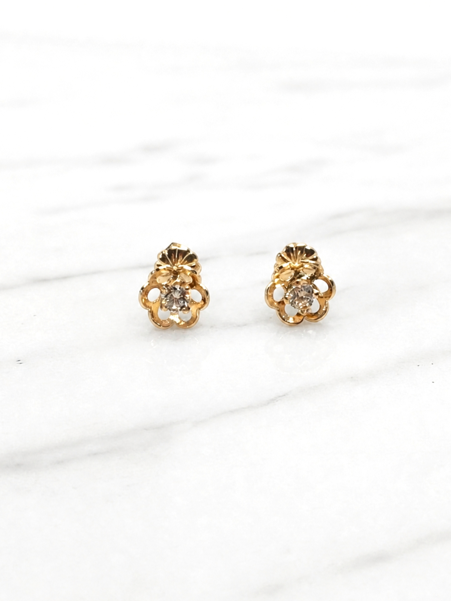 Aros flores circón Oro 18k 1