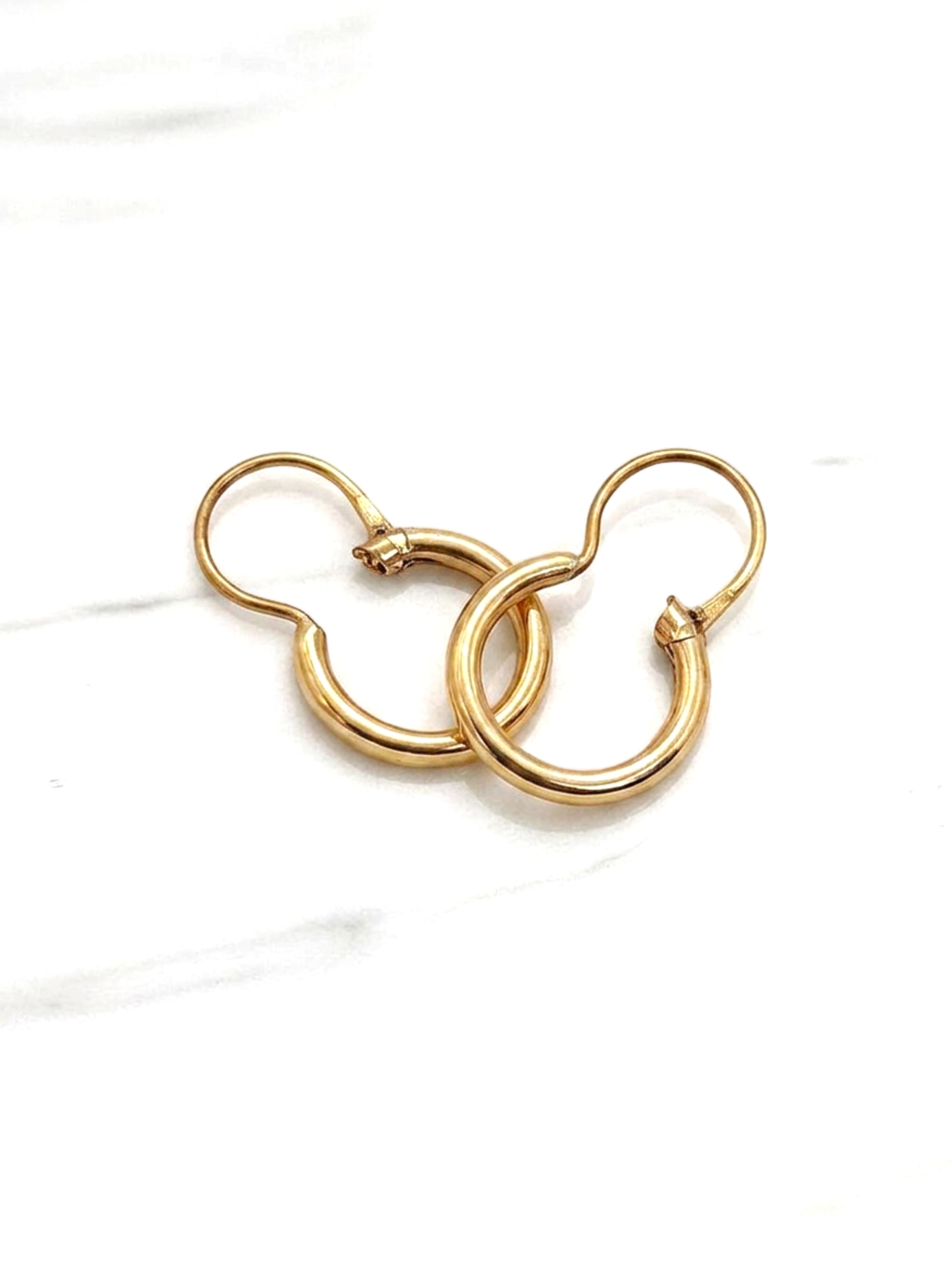 Aros argolla tubo con gancho número 1 Oro 18k 2