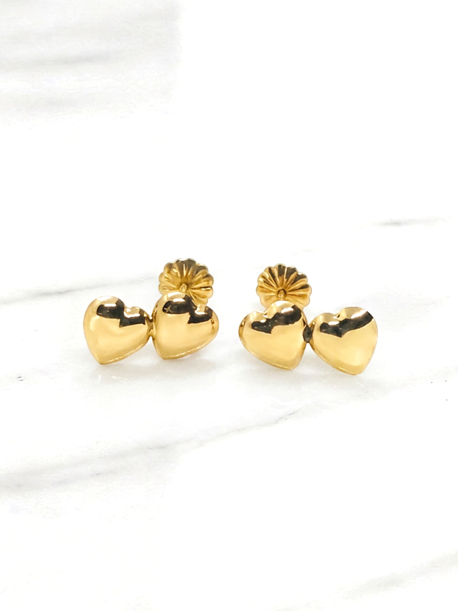 Aros 2 corazones medianos Oro 18k 1