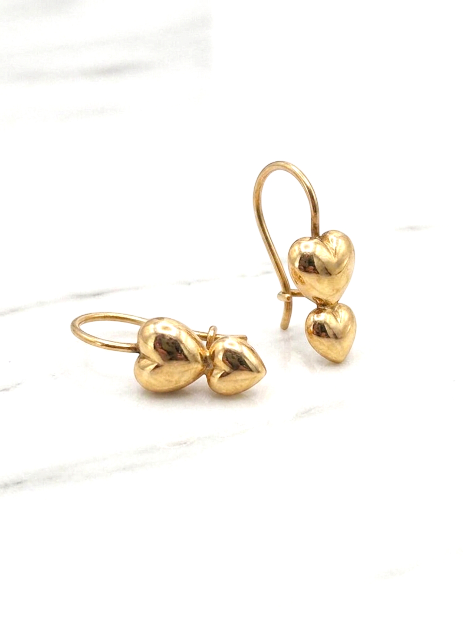 Aros dos corazones gancho Oro 18k 1