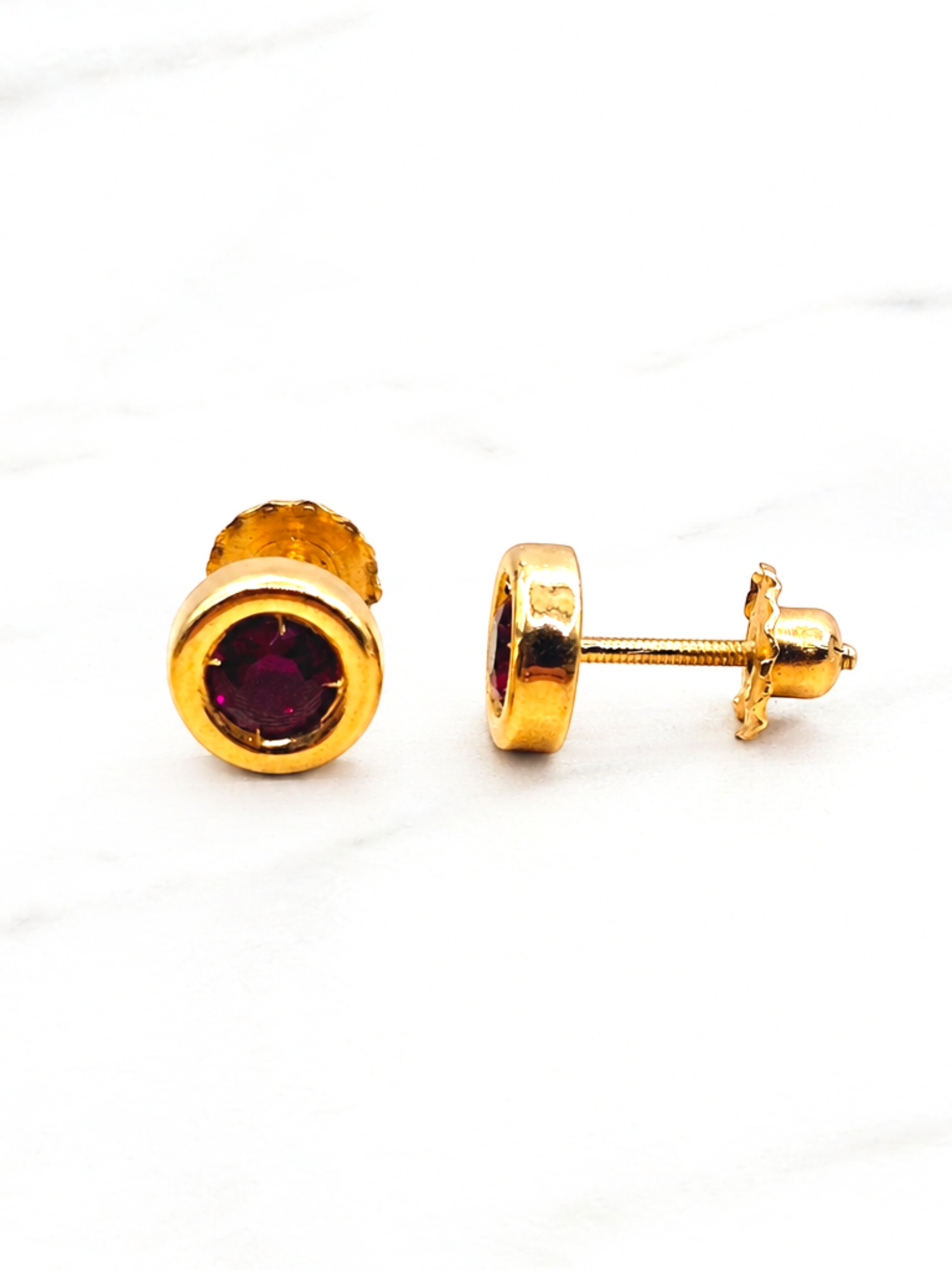 Aros punto de luz rubí Oro 18k 3