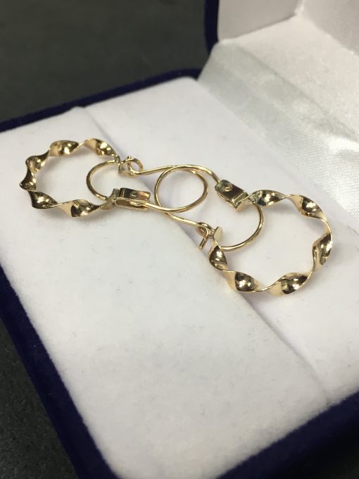 Aros argollas espiral 2.5 grs Oro 18k 1