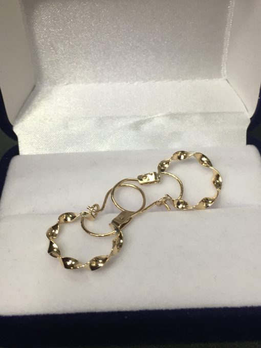 Aros argollas espiral 2.5 grs Oro 18k 2