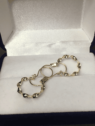 Aros argollas espiral 2.5 grs Oro 18k