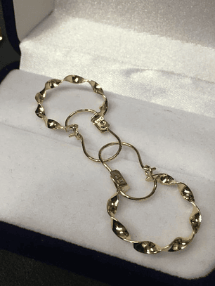 Aros argolla espiral 2.8 grs Oro 18k