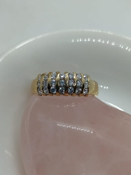 Anillo medio cintillo triple circón 4 grs Oro 18k 3