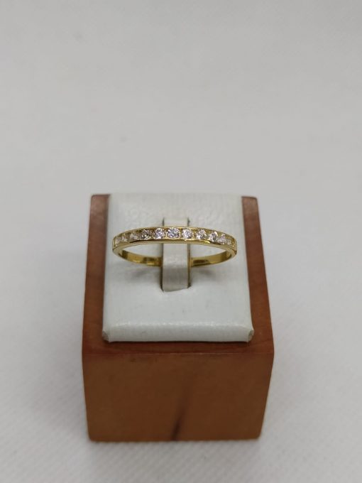 Anillo medio cintillo riel circónes 2.2 grs Oro 18k 3