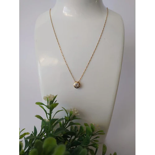 Cadena limada 50 cm y punto de luz pasado con circón 3 grs Oro 18k