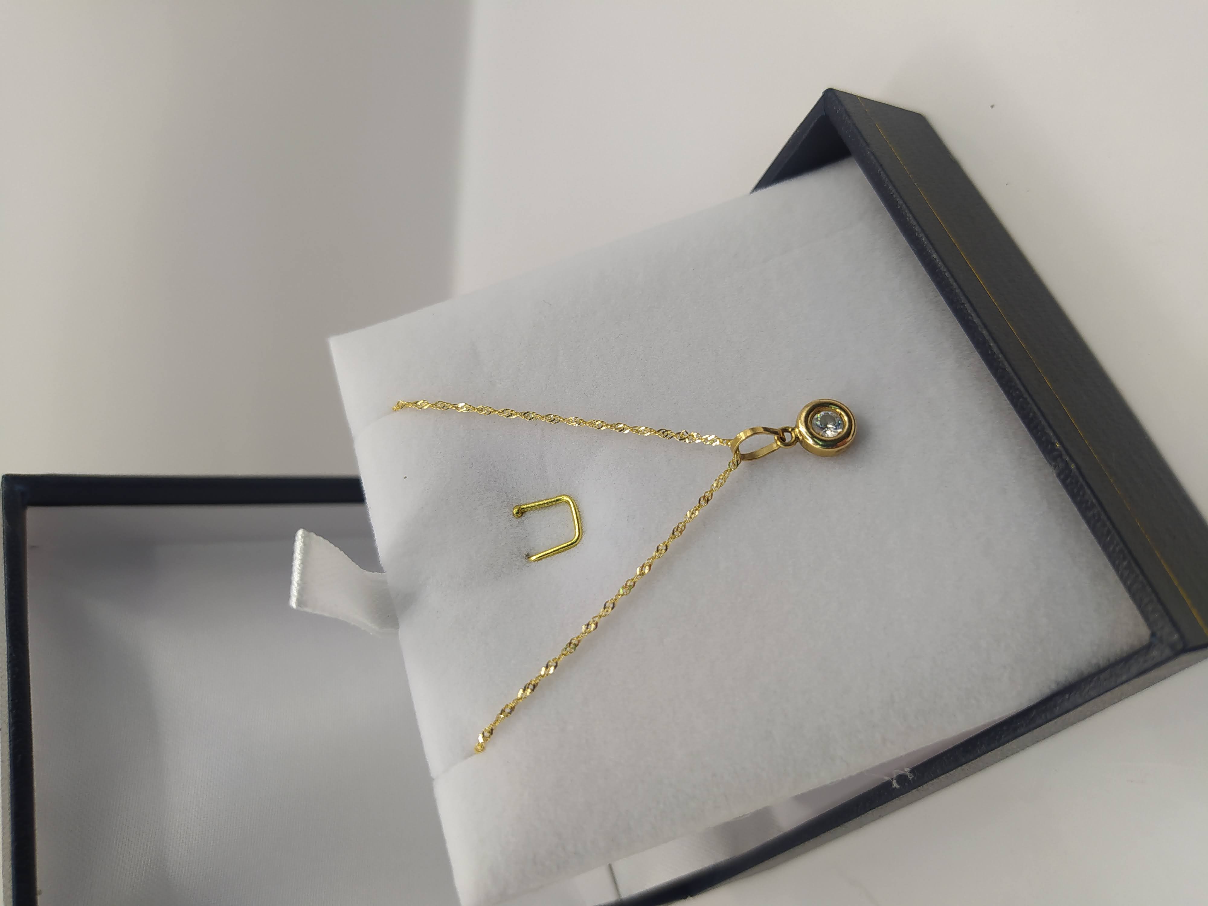 Cadena singapur 45 cm con punto de luz circón 1.6 grs de Oro italiano 18k 1