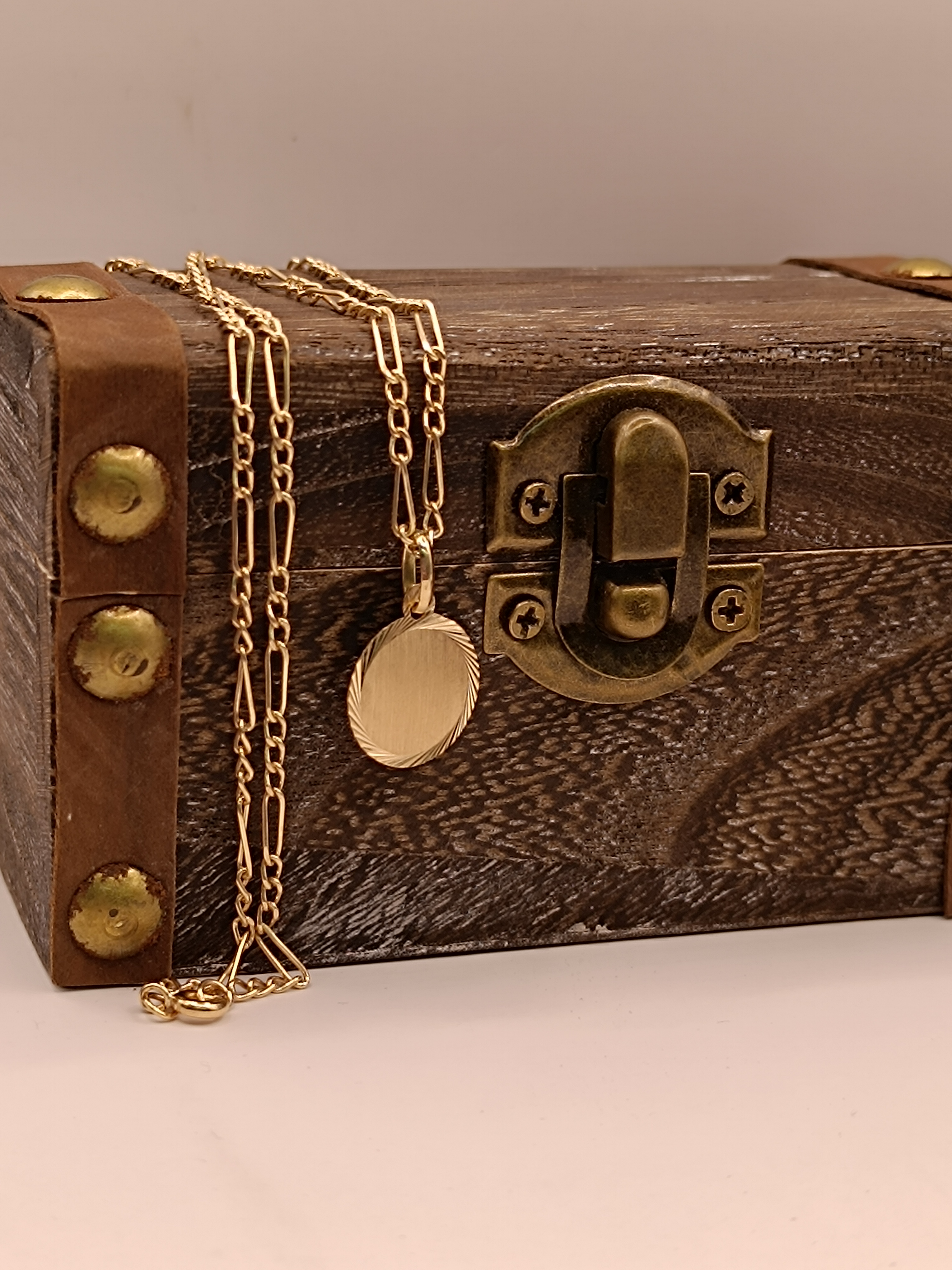 Cadena cartier 60 cm con disco 7.0 grs Oro 18k 1