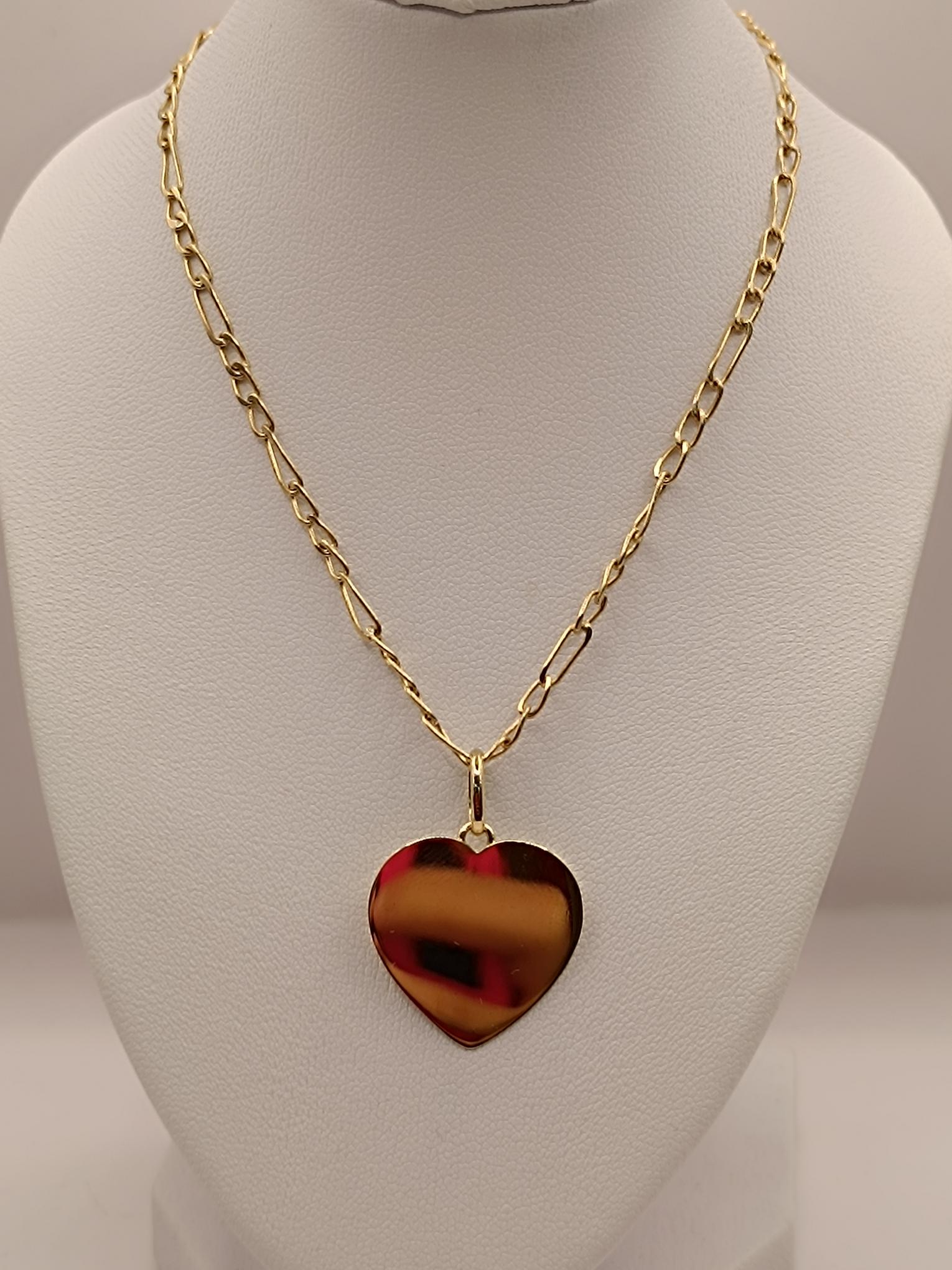 Cadena cartier 50 cm con corazón liso 2 cm 7.5 grs Oro 18k 1
