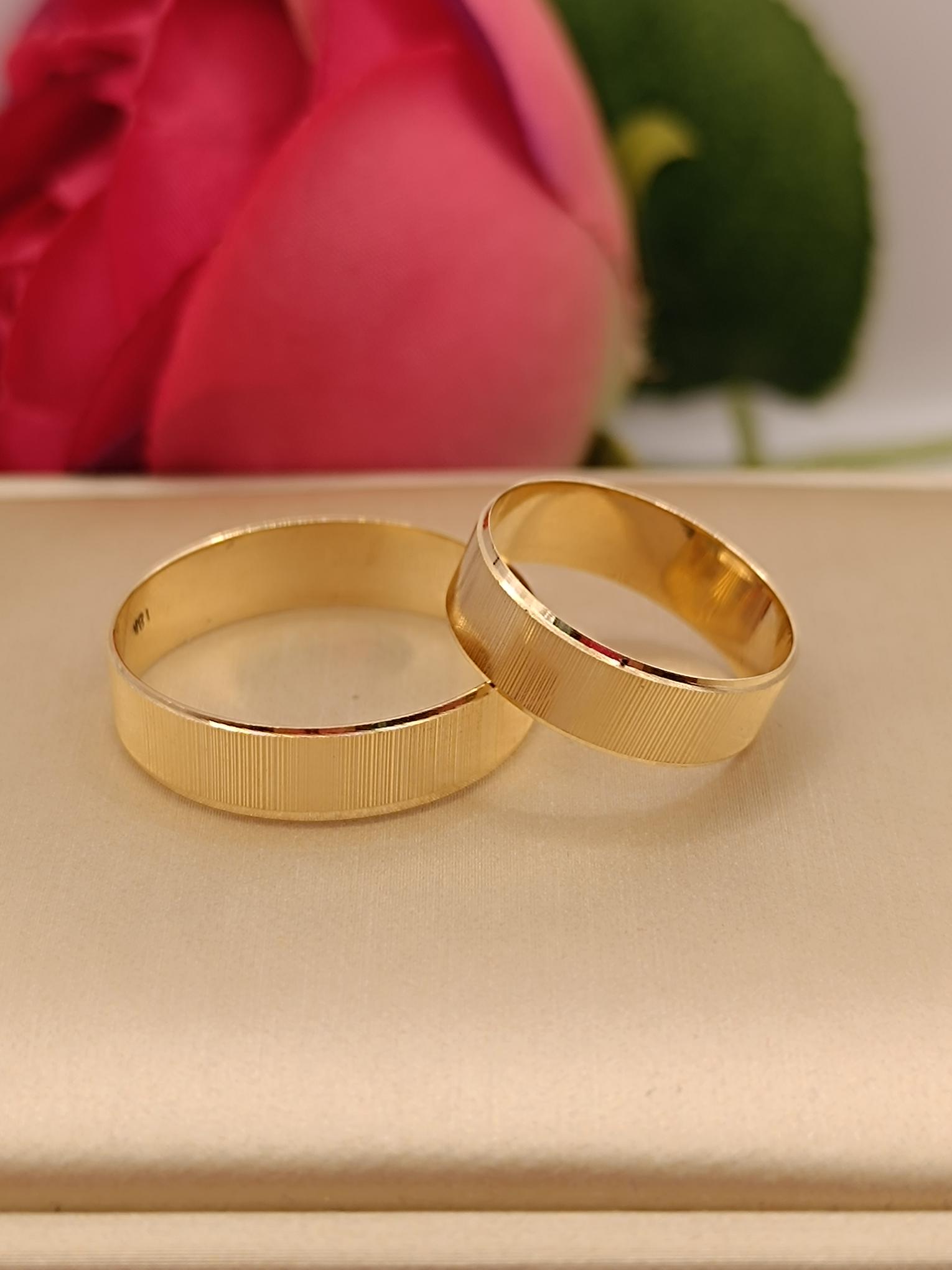 Argollas de matrimonio talladas mil rayas 5 mm 5 grs Oro 18k 5