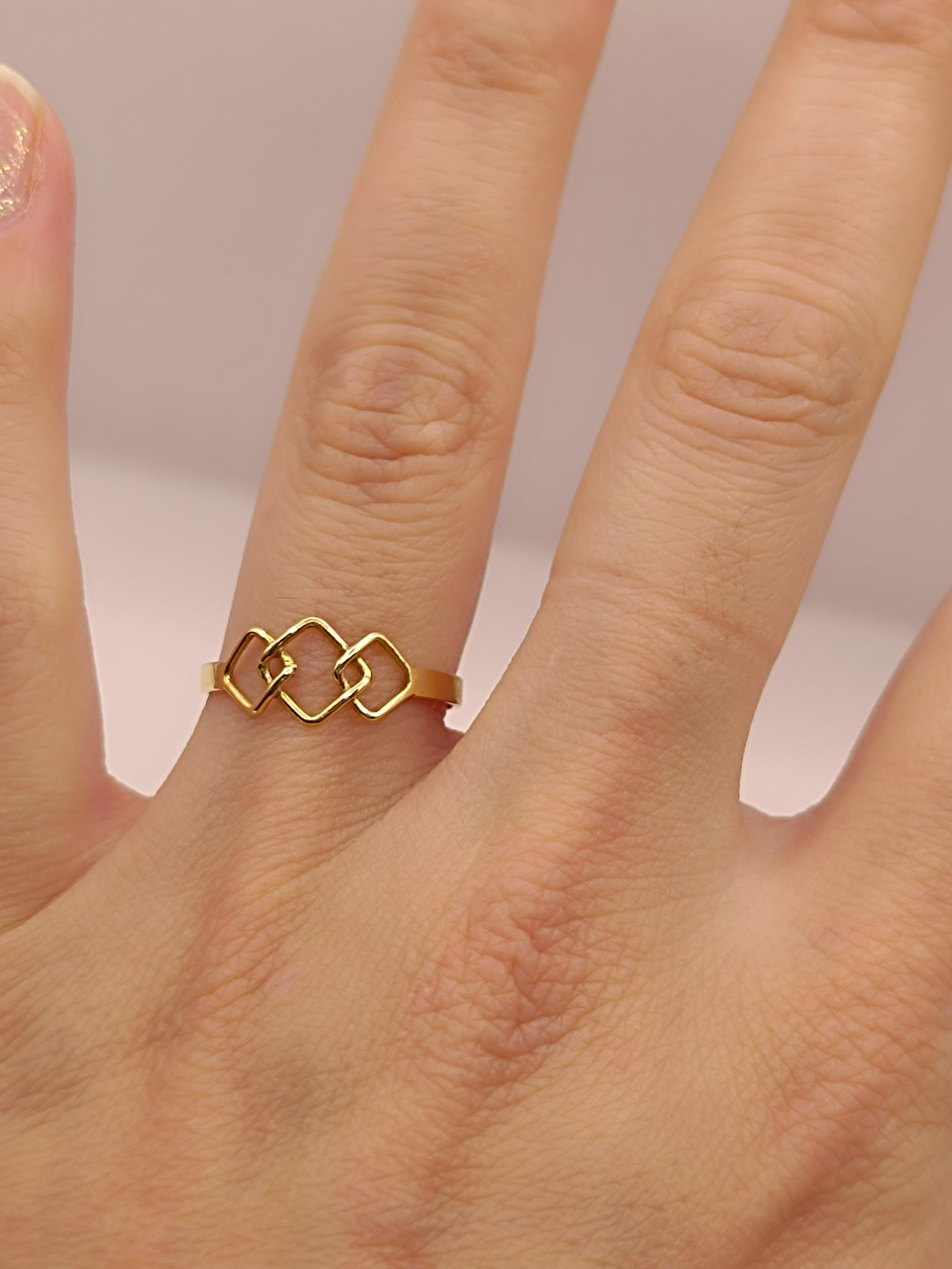 Anillo juvenil rombos 1.3 grs Oro 18k 1