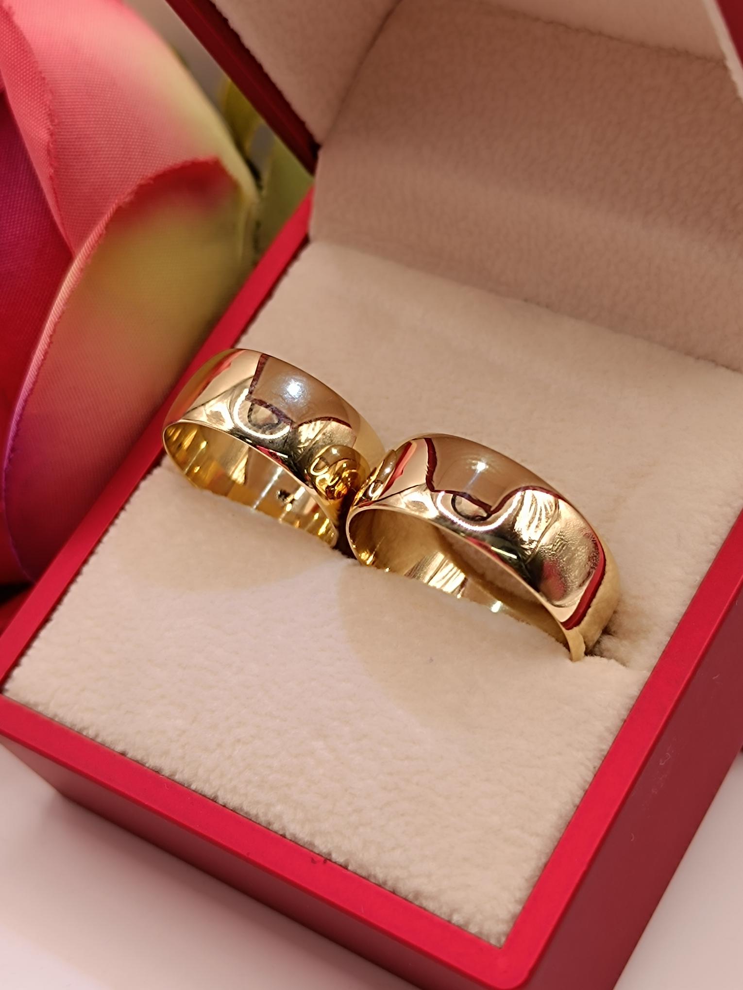 Argollas media caña 8 mm 14 grs Oro 18k 4