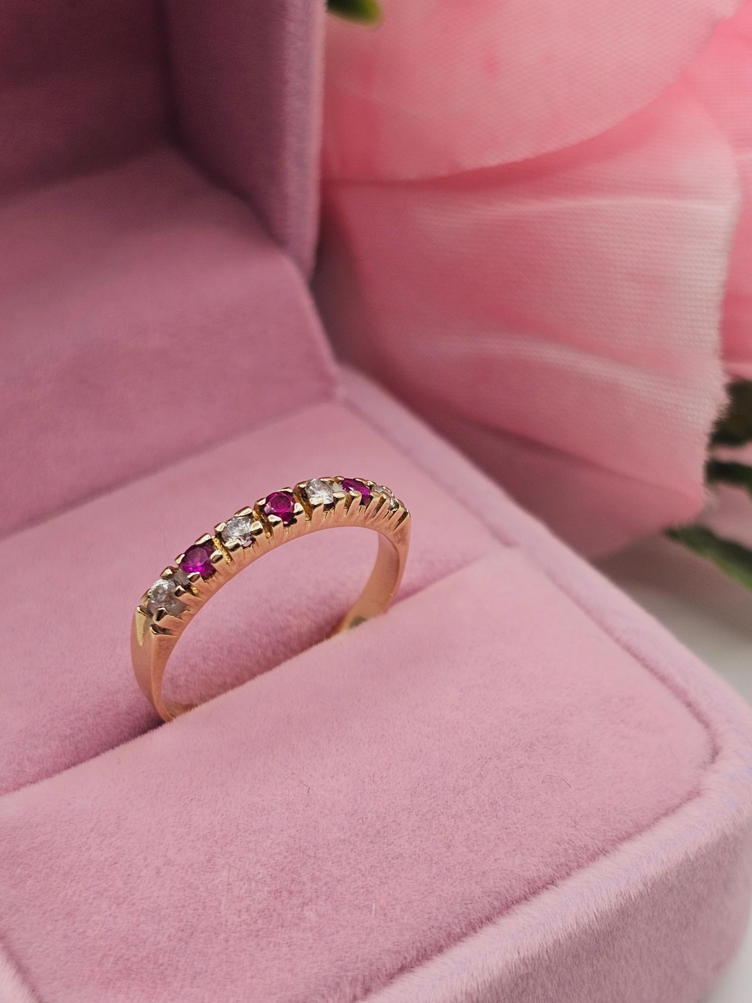 Anillo medio cintillo rubíes y circones 2.8 grs Oro 18k 1