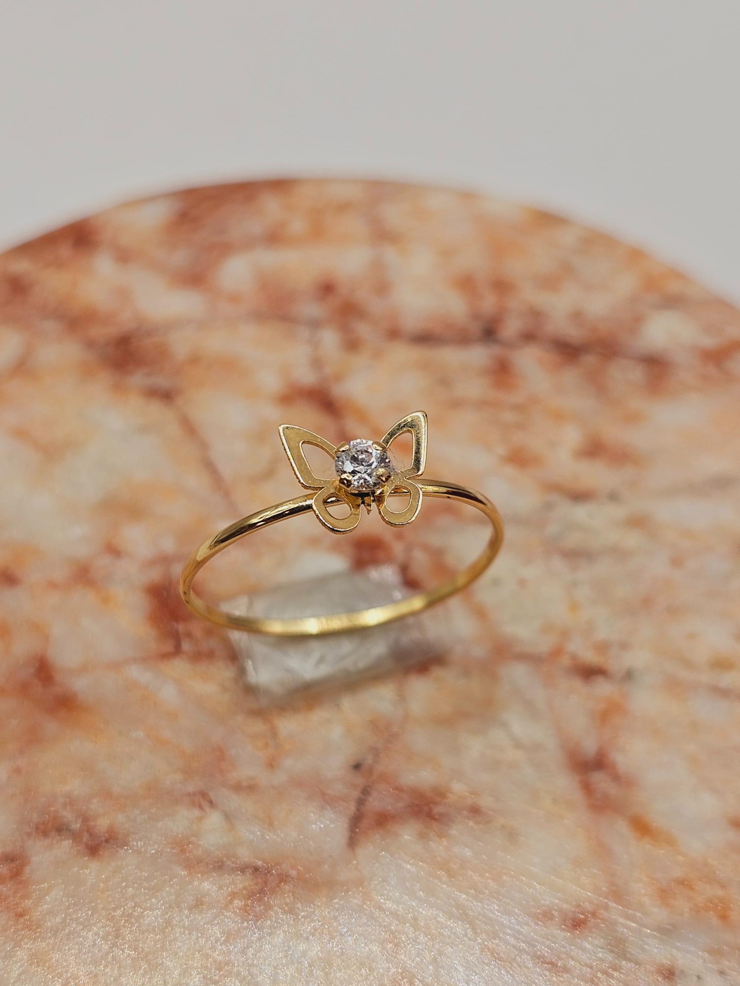 Anillo mariposa circón 1.1 grs Oro 18k 4