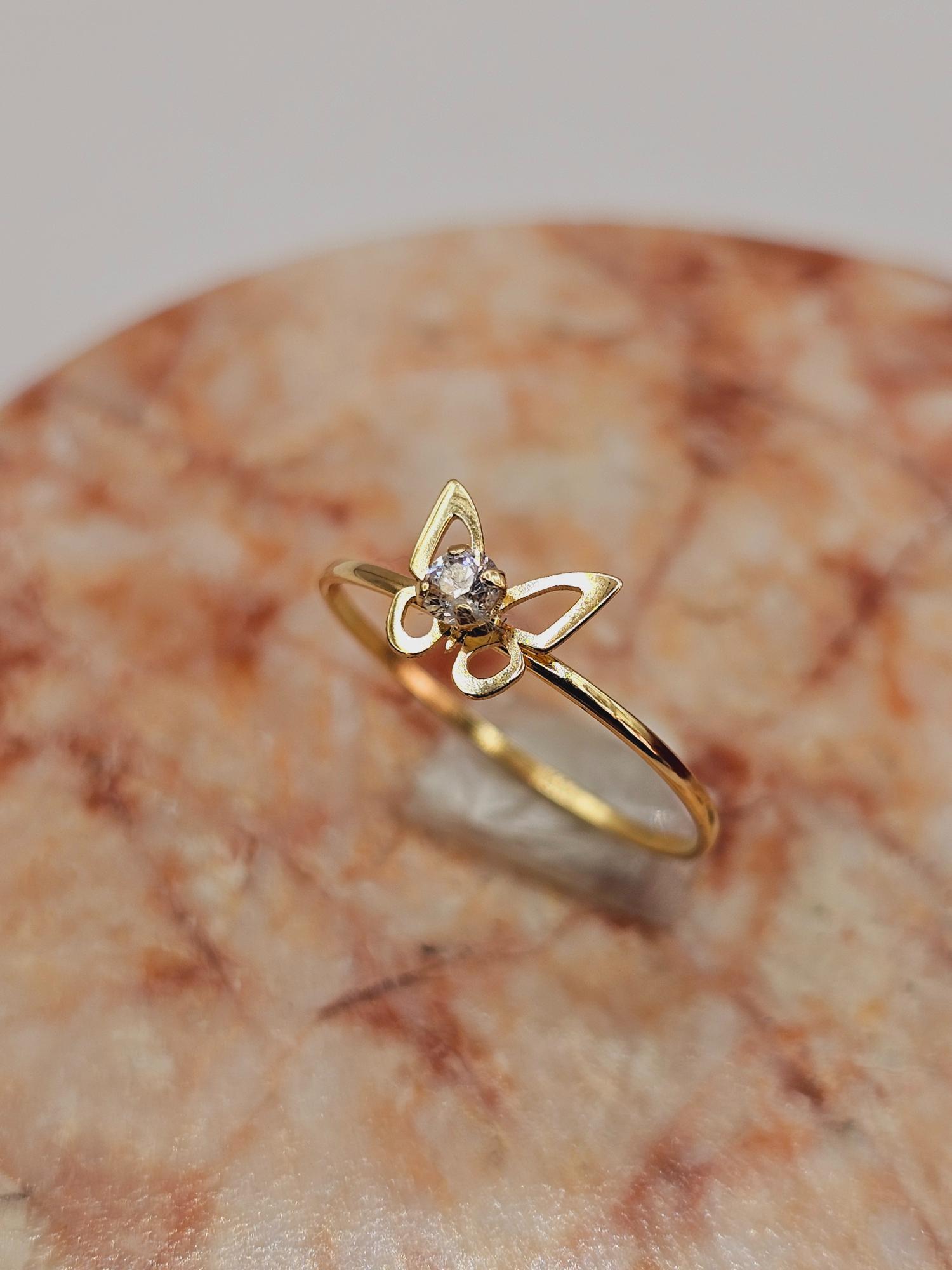 Anillo mariposa circón 1.1 grs Oro 18k 6