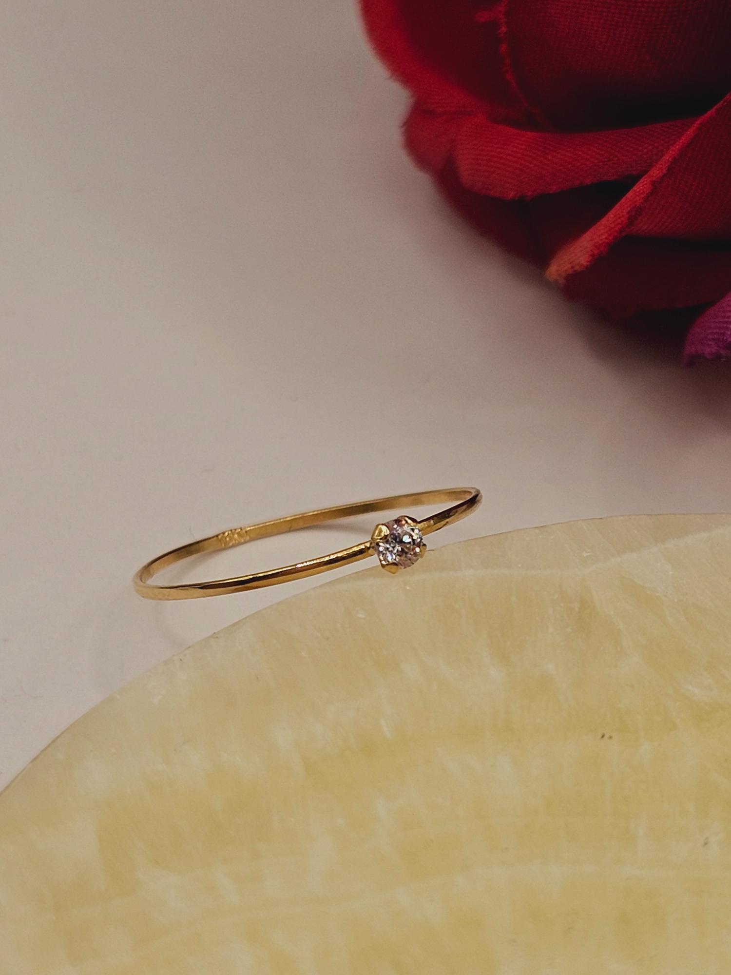 Anillo solitario circón 0.5 grs Oro 18k 3