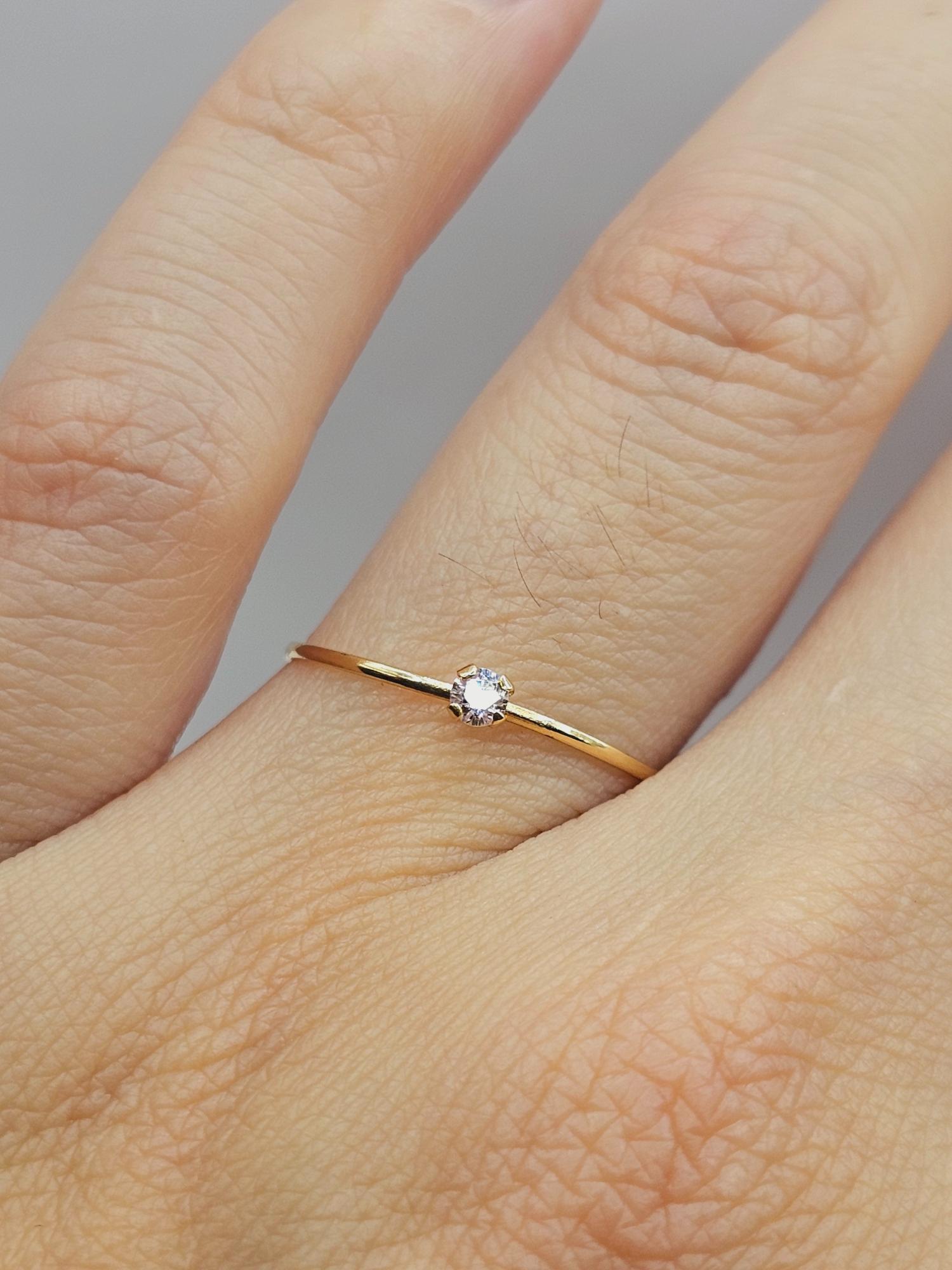 Anillo solitario circón 0.5 grs Oro 18k 2