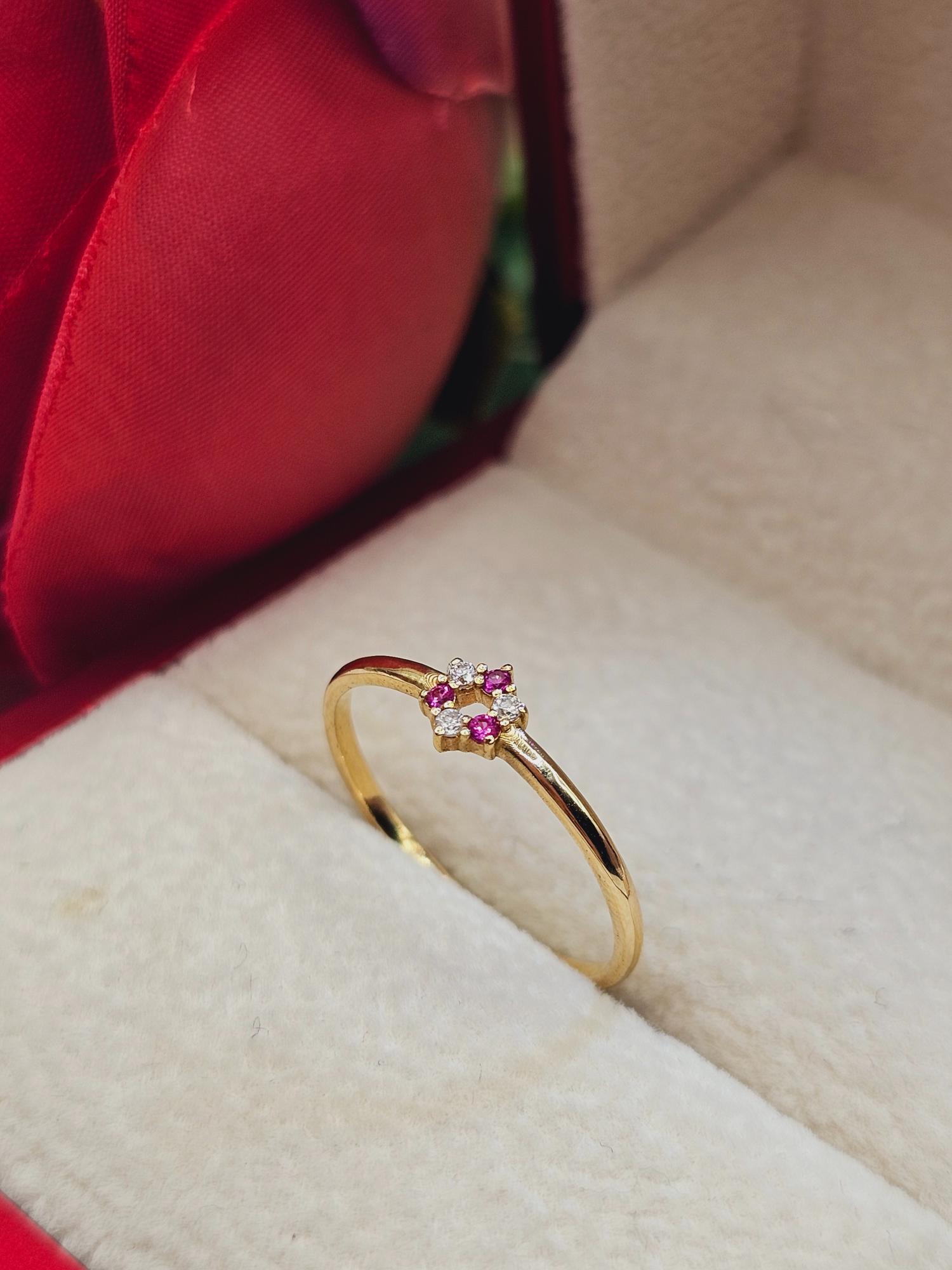 Anillo roseta rubíes y circones 1.6 grs Oro 18k 3