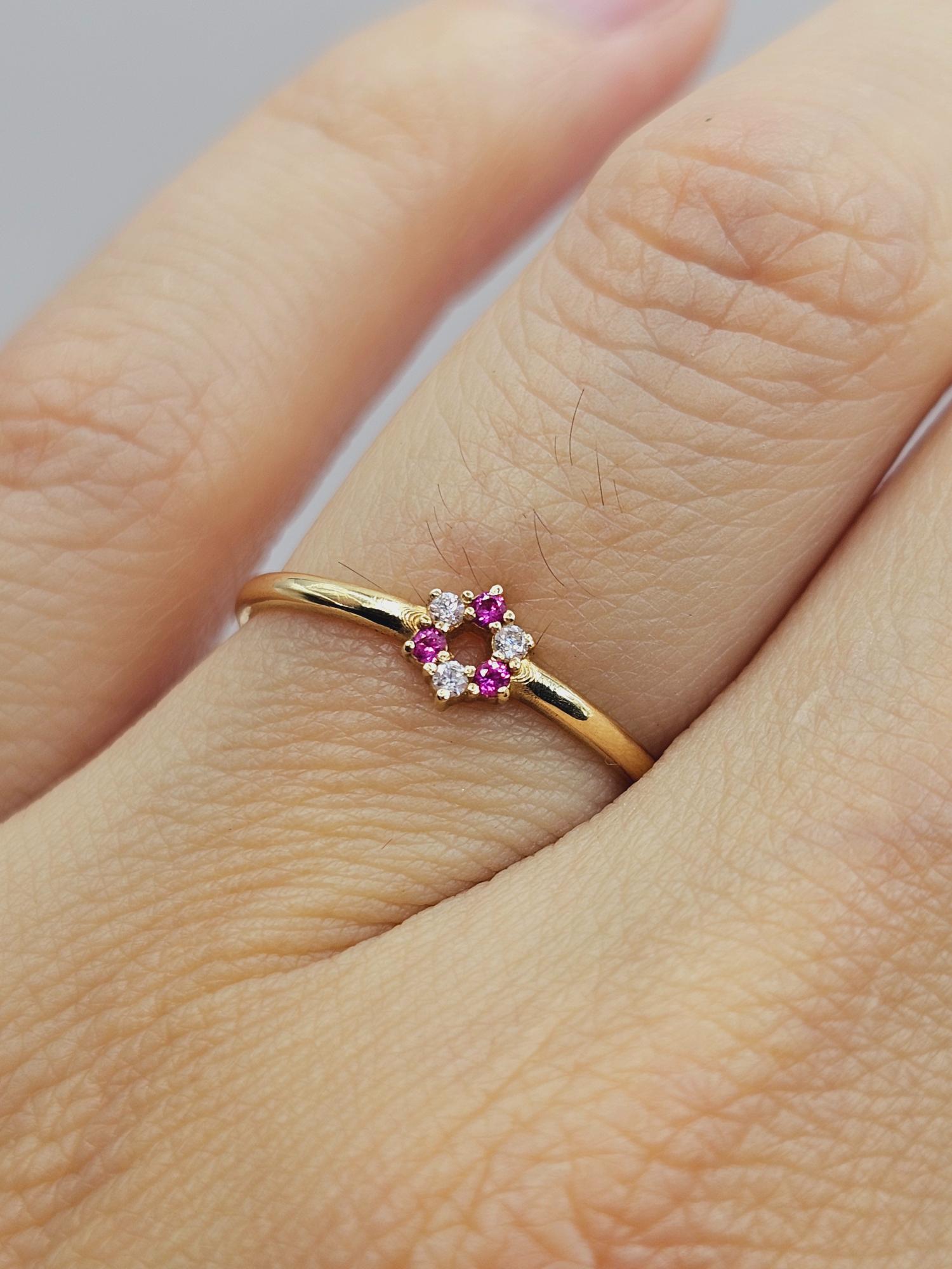 Anillo roseta rubíes y circones 1.6 grs Oro 18k 4