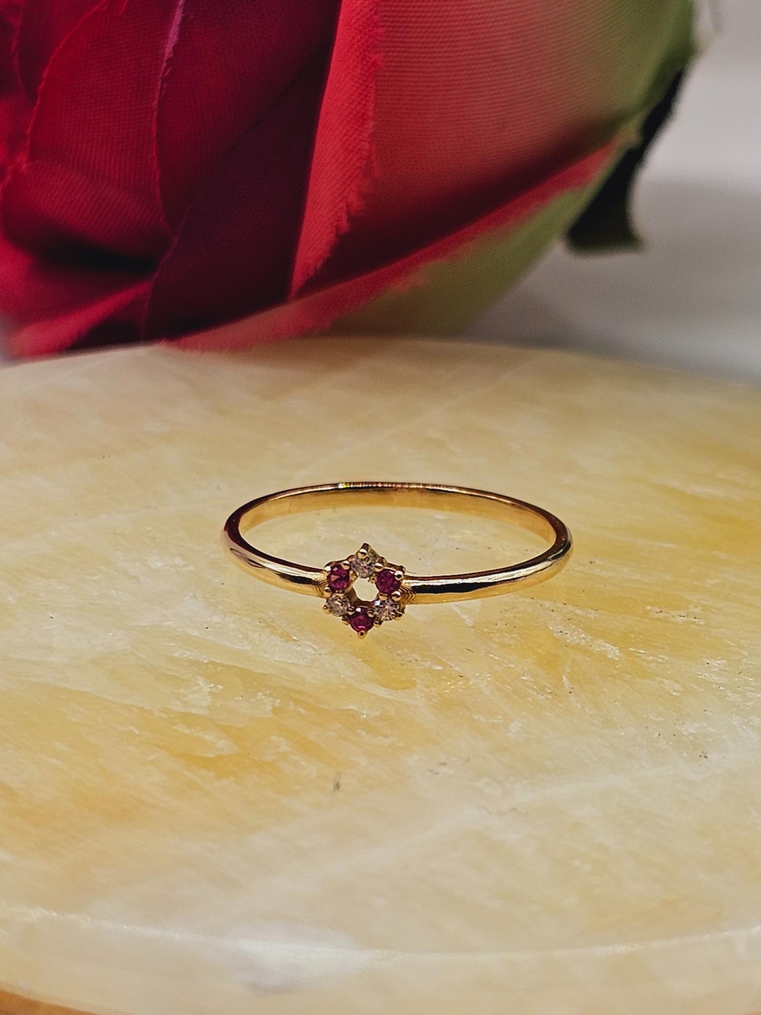 Anillo roseta rubíes y circones 1.6 grs Oro 18k 6