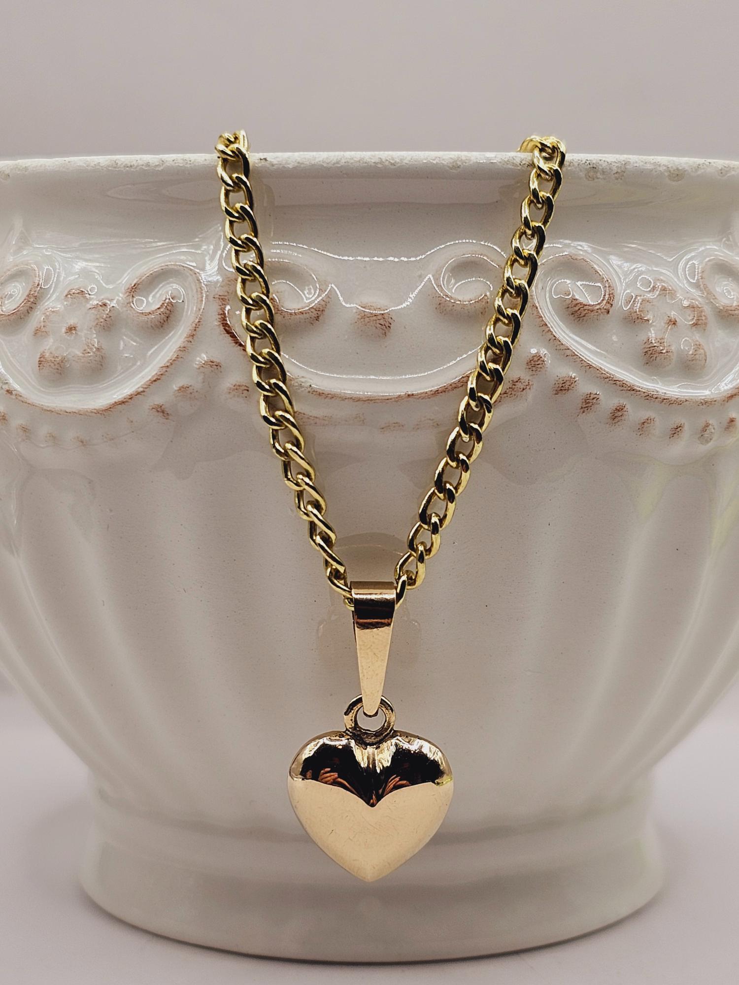 Cadena grumete 55 cm y corazón 28 mm 19 grs Oro 18k 1