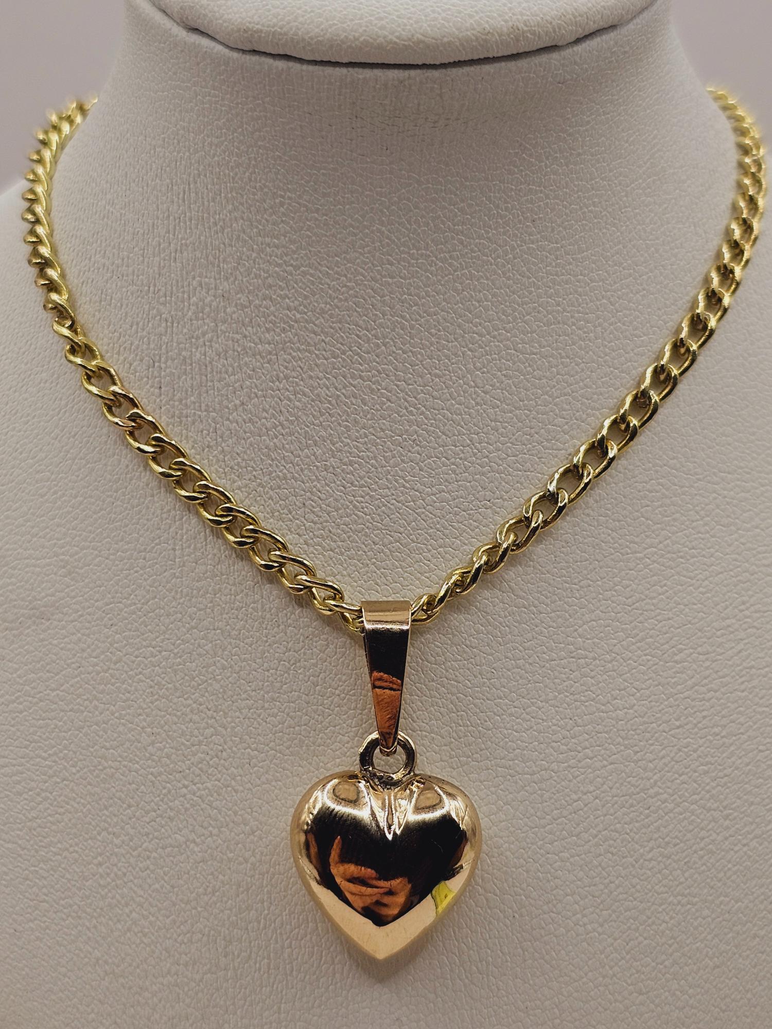 Cadena grumete 55 cm y corazón 28 mm 19 grs Oro 18k 3