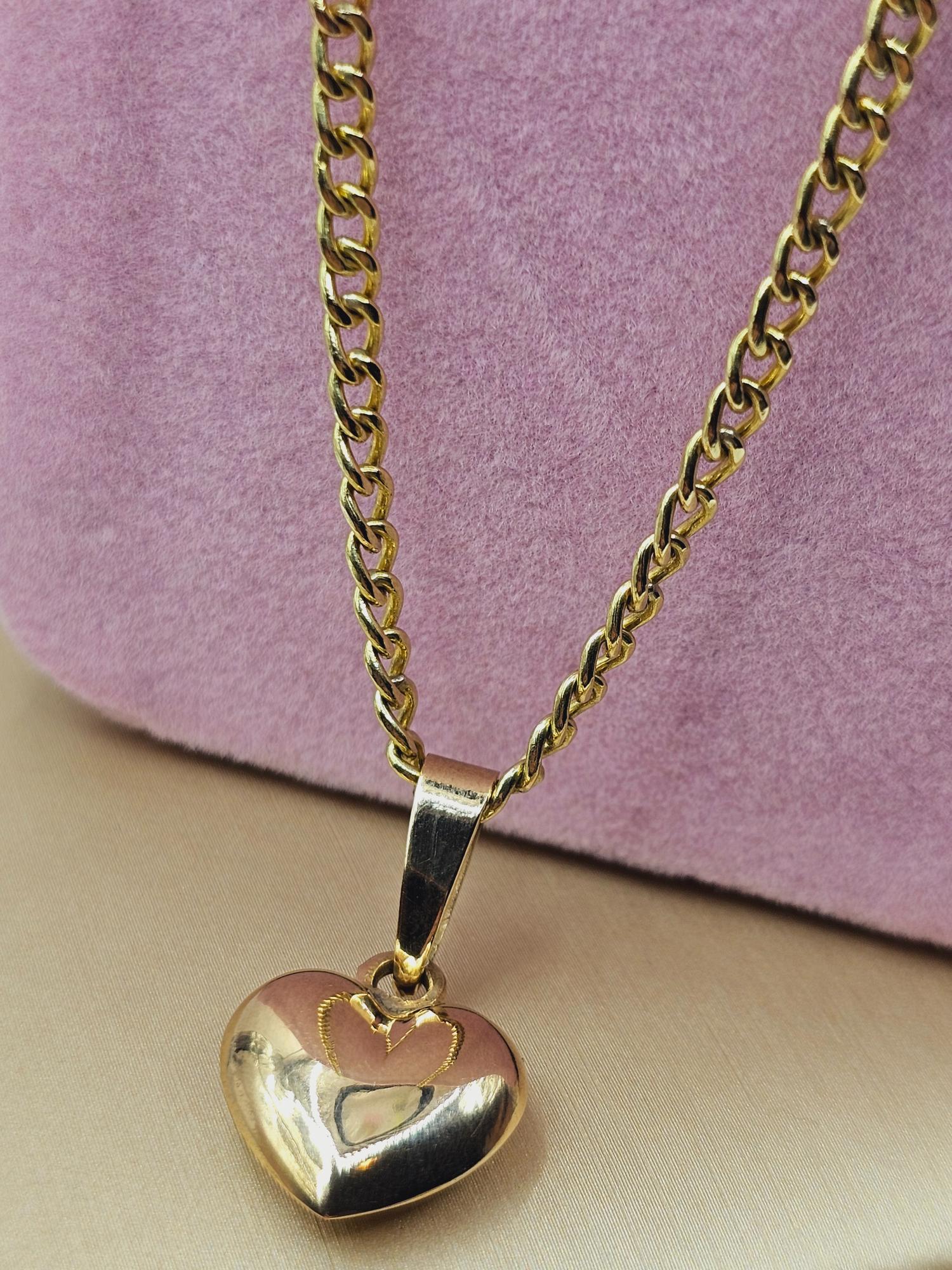 Cadena grumete 55 cm y corazón 28 mm 19 grs Oro 18k 7