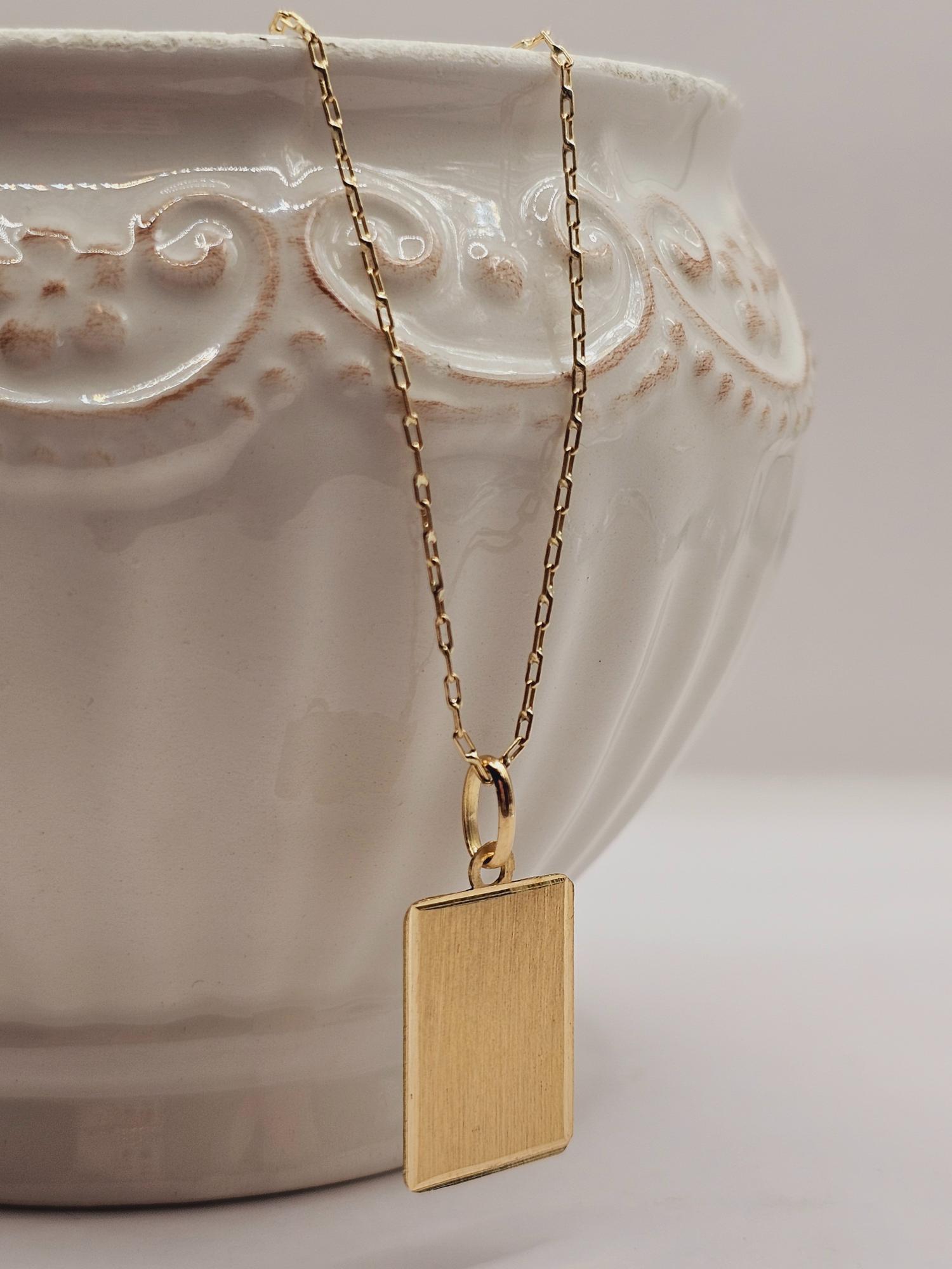 Cadena limada 50 cm y placa 19 mm 3.6 grs Oro 18k 5