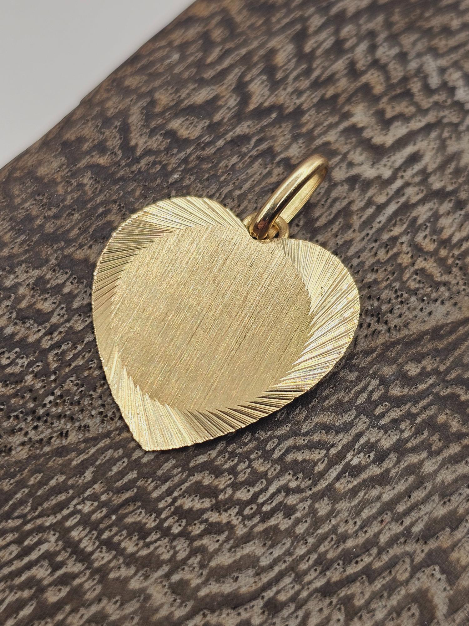 Colgante corazón satinado 24 mm 1.5 grs Oro 18k 3