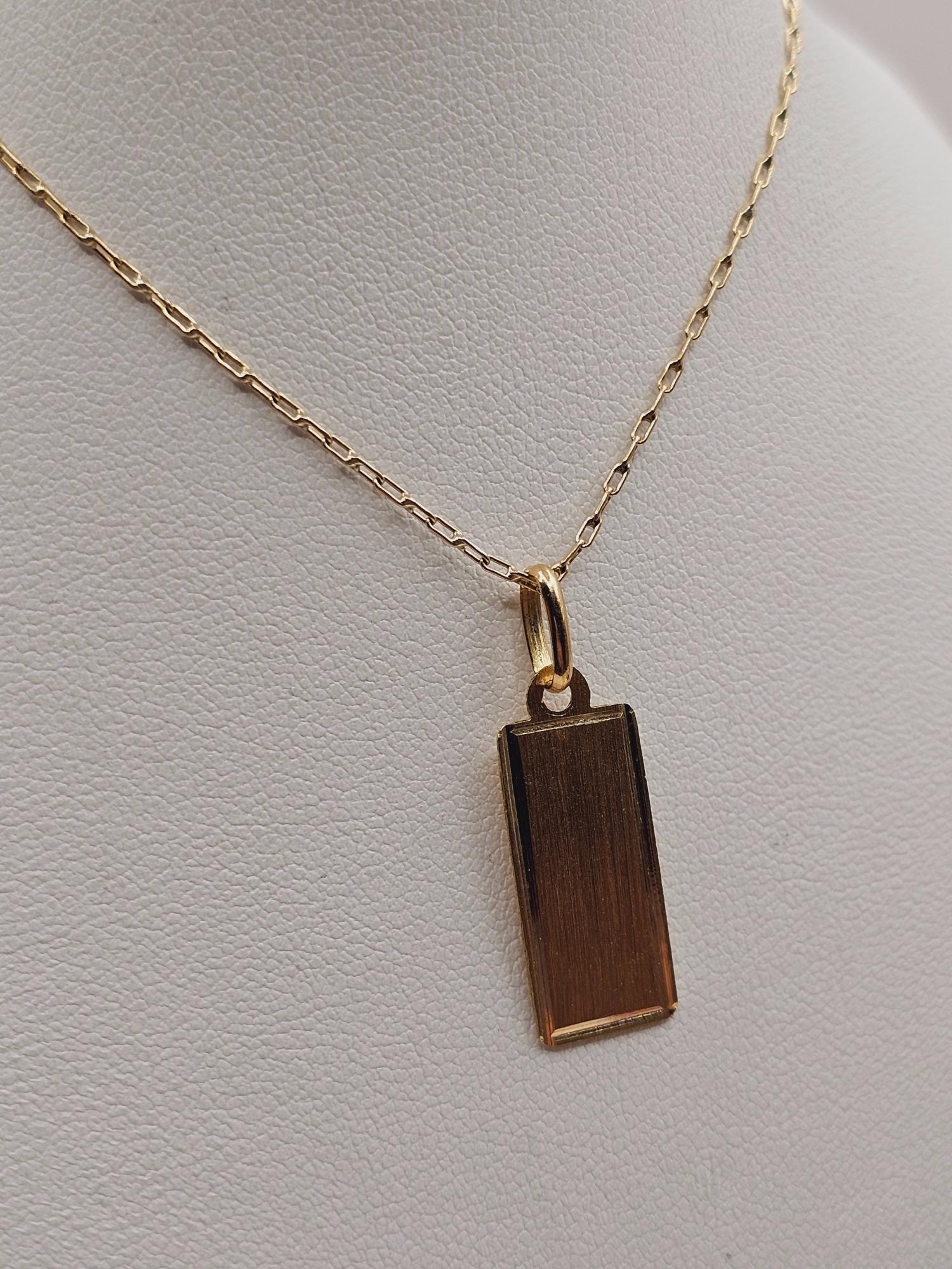 Cadena limada 50 cm y placa rectangular 2 cm 3.1 grs Oro 18k 5