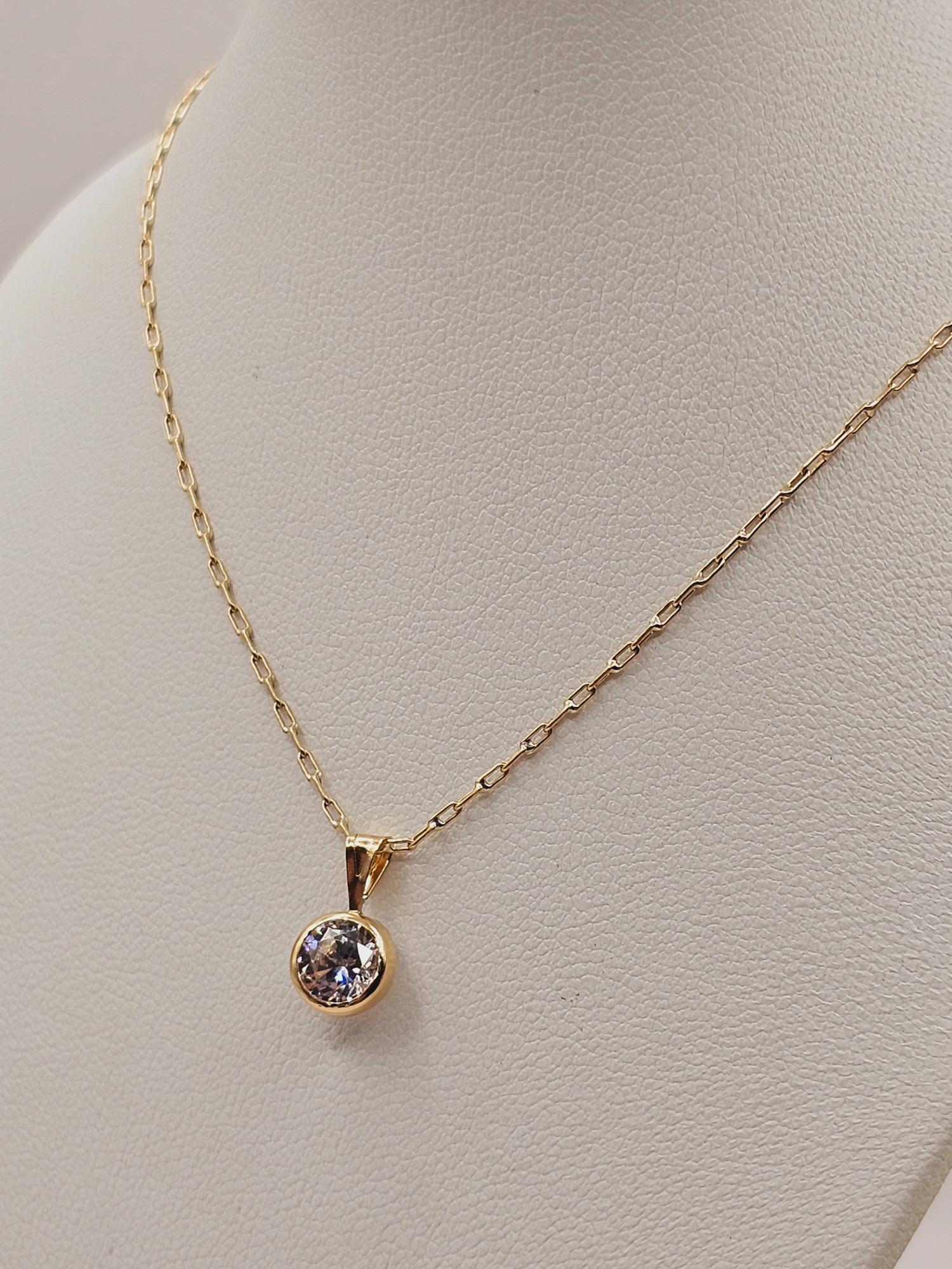 Cadena 50 cm y punto de luz 2.6 grs Oro 18k 4