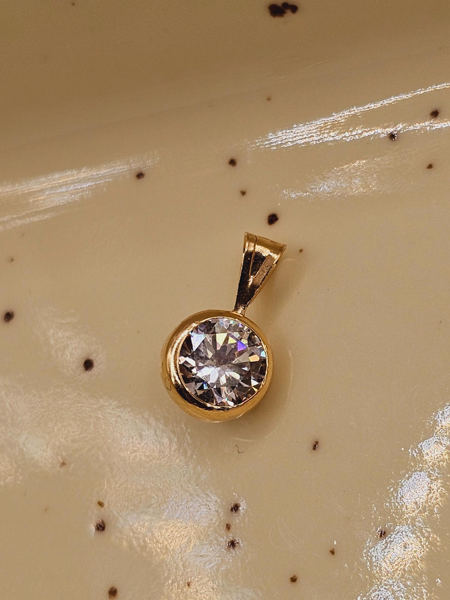 Colgante punto de luz 11 mm 0.5 grs Oro 18k 3