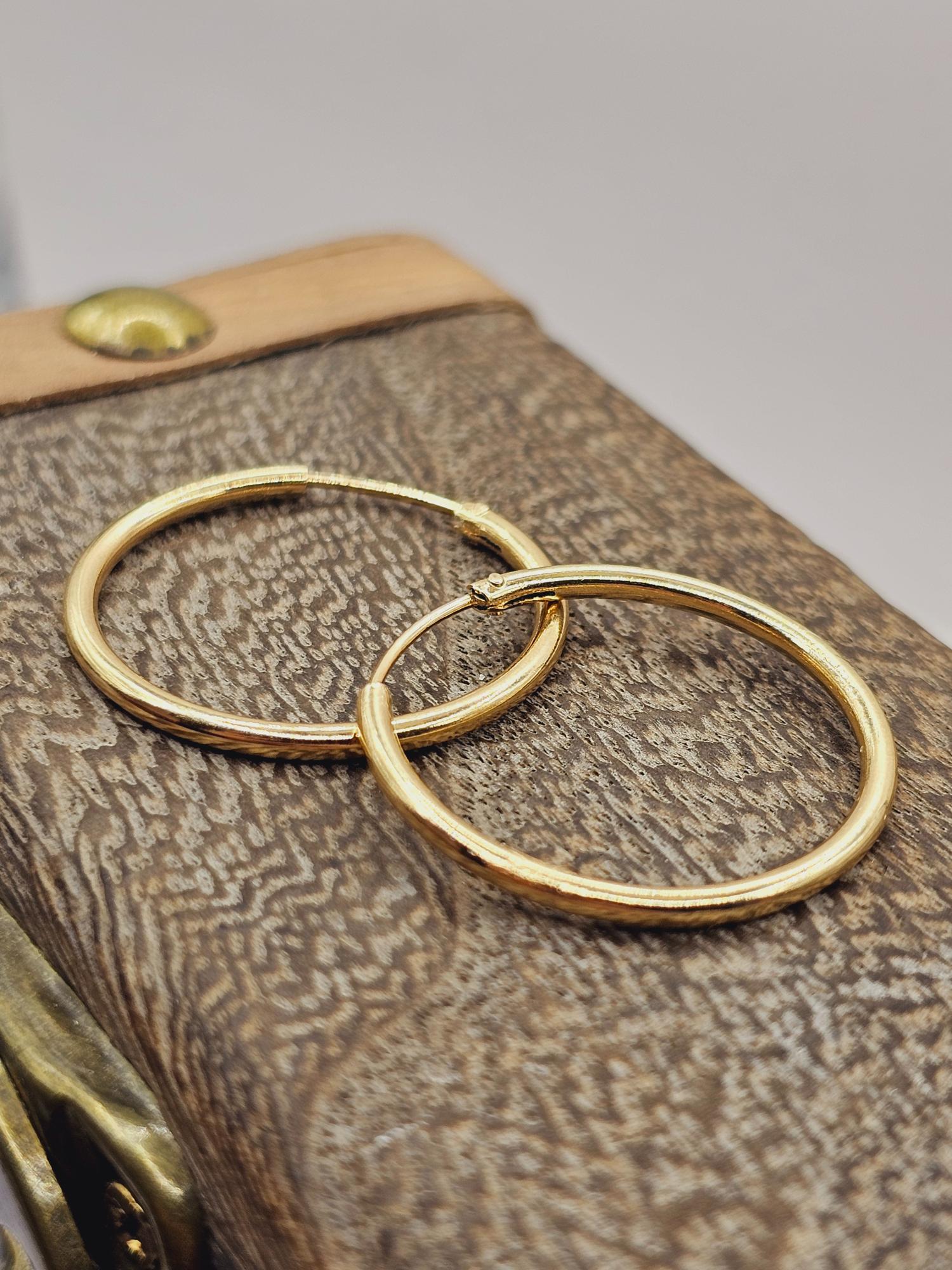 Aros argolla tubo 25 mm 2.2 grs Oro 18k 2