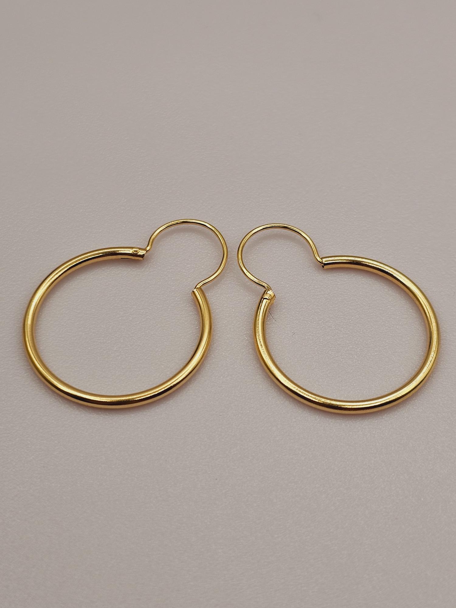 Aros argolla tubo con gancho 31 mm 2.4 grs Oro 18k 2