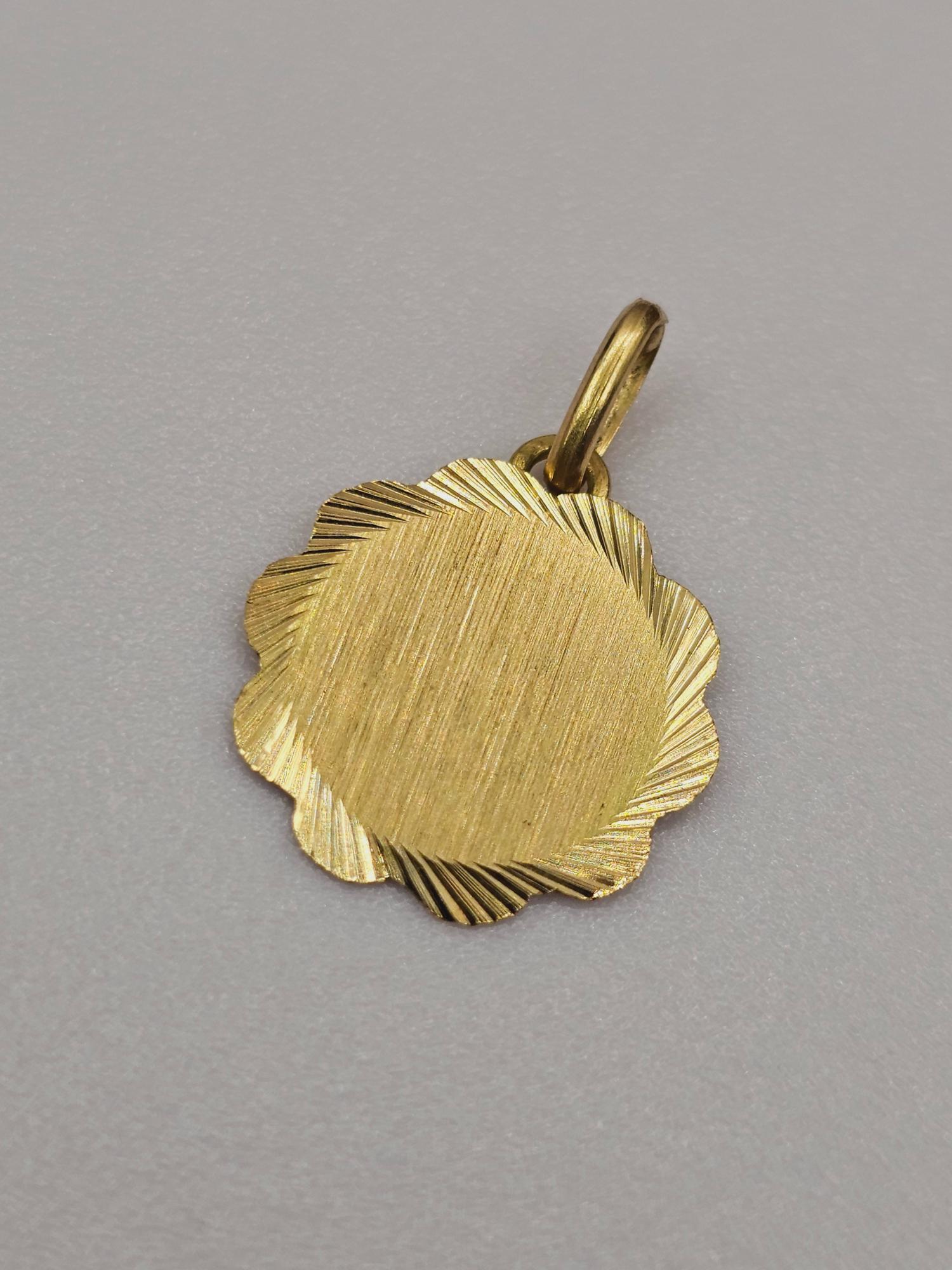 Colgante disco flor 17 mm 1.2 grs Oro 18k  2