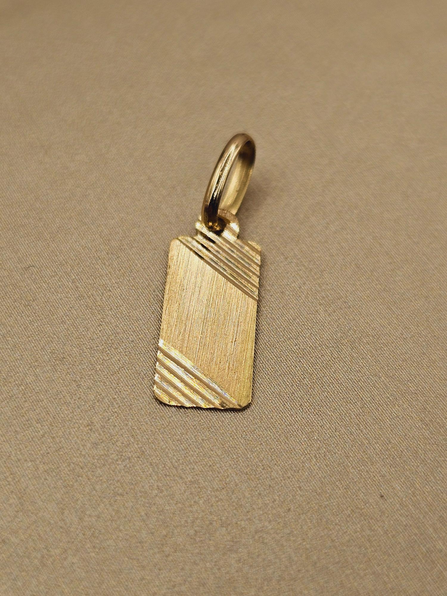 Colgante placa satinada 2 cm 0.6 grs Oro 18k 1