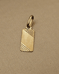 Colgante placa satinada 2 cm 0.6 grs Oro 18k